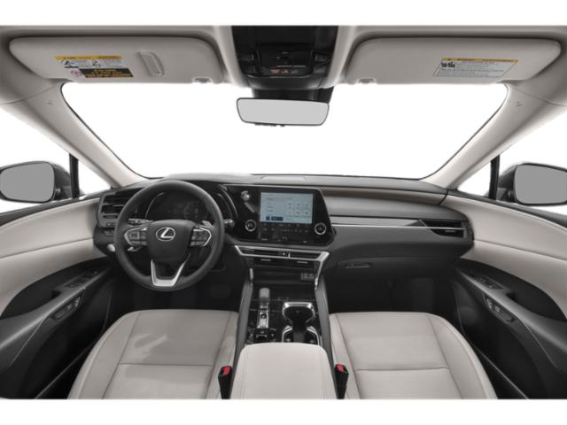 Modern luxury car interior with steering wheel, touchscreen, and center console