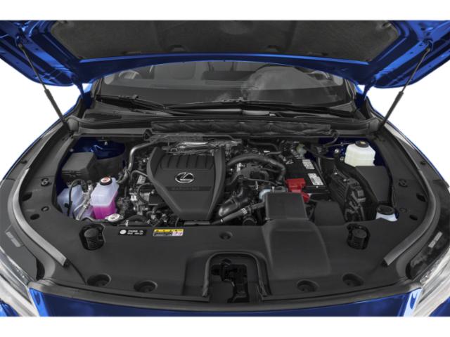 Open engine bay with visible engine components and fluid reservoirs.