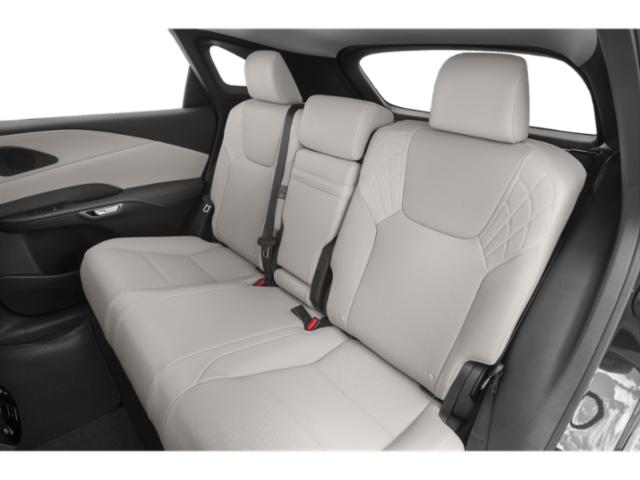 Rear seats with premium light-colored leather upholstery and modern design