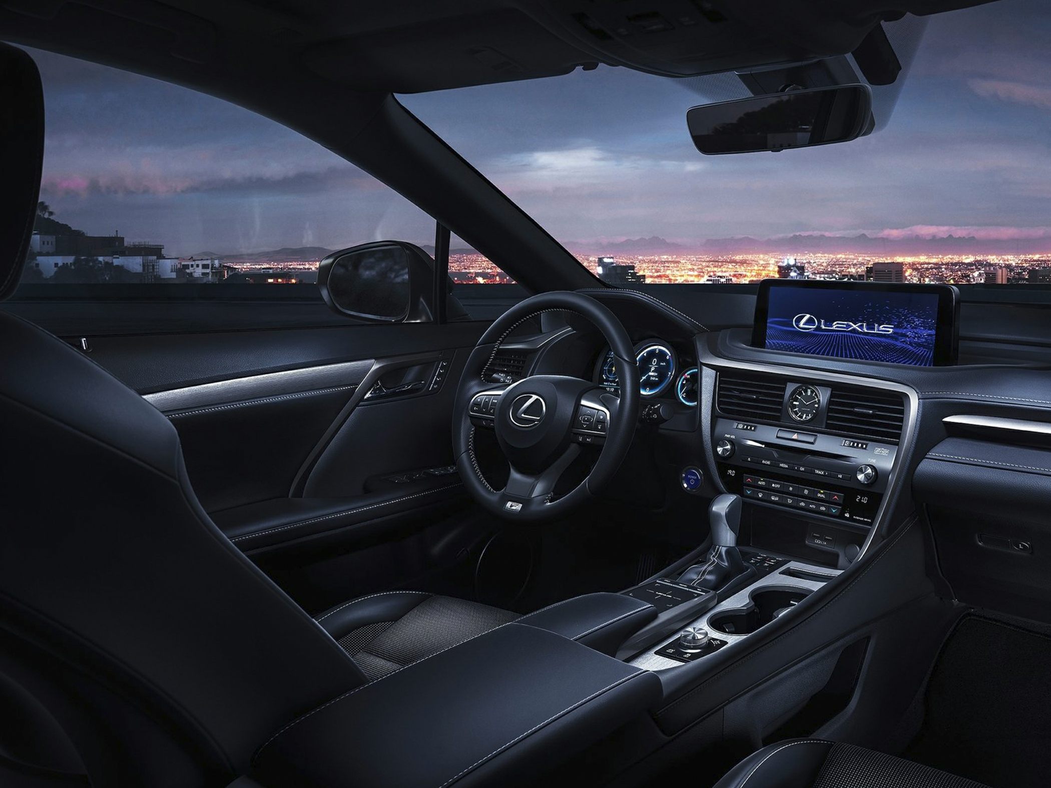 Luxury car interior with dashboard, steering wheel, and infotainment screen