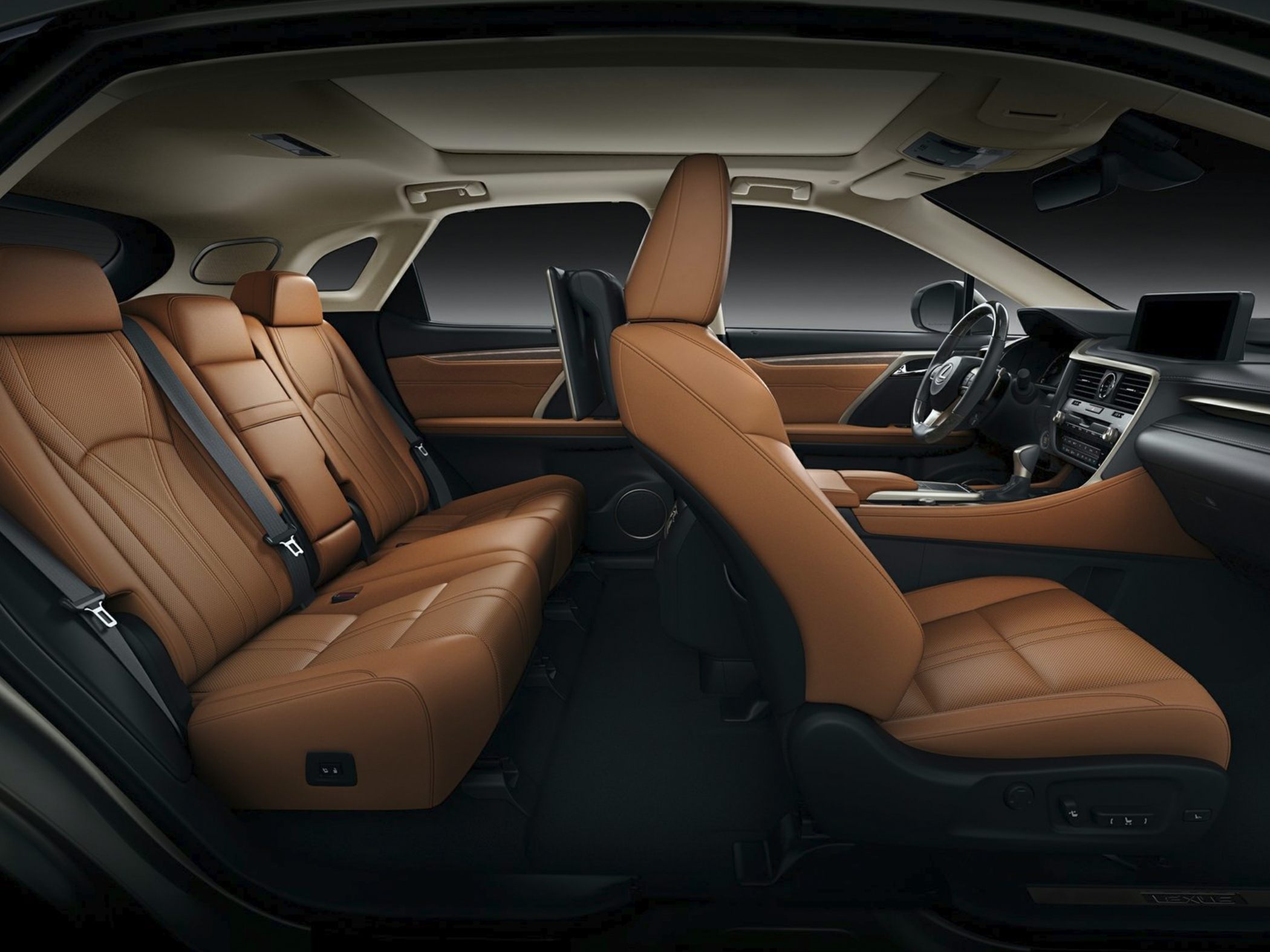 Brown leather interior with luxury seats and modern dashboard.