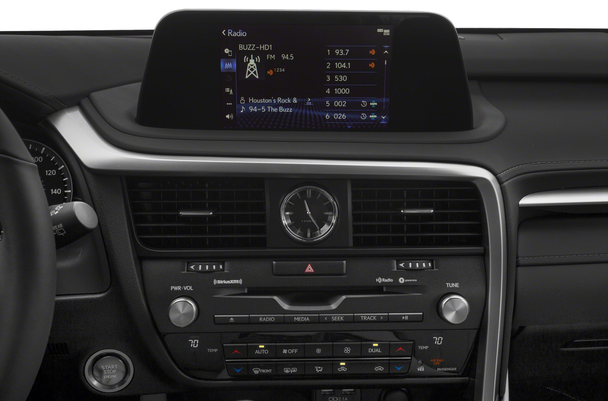 Central analog clock, touchscreen infotainment, dual-zone climate control