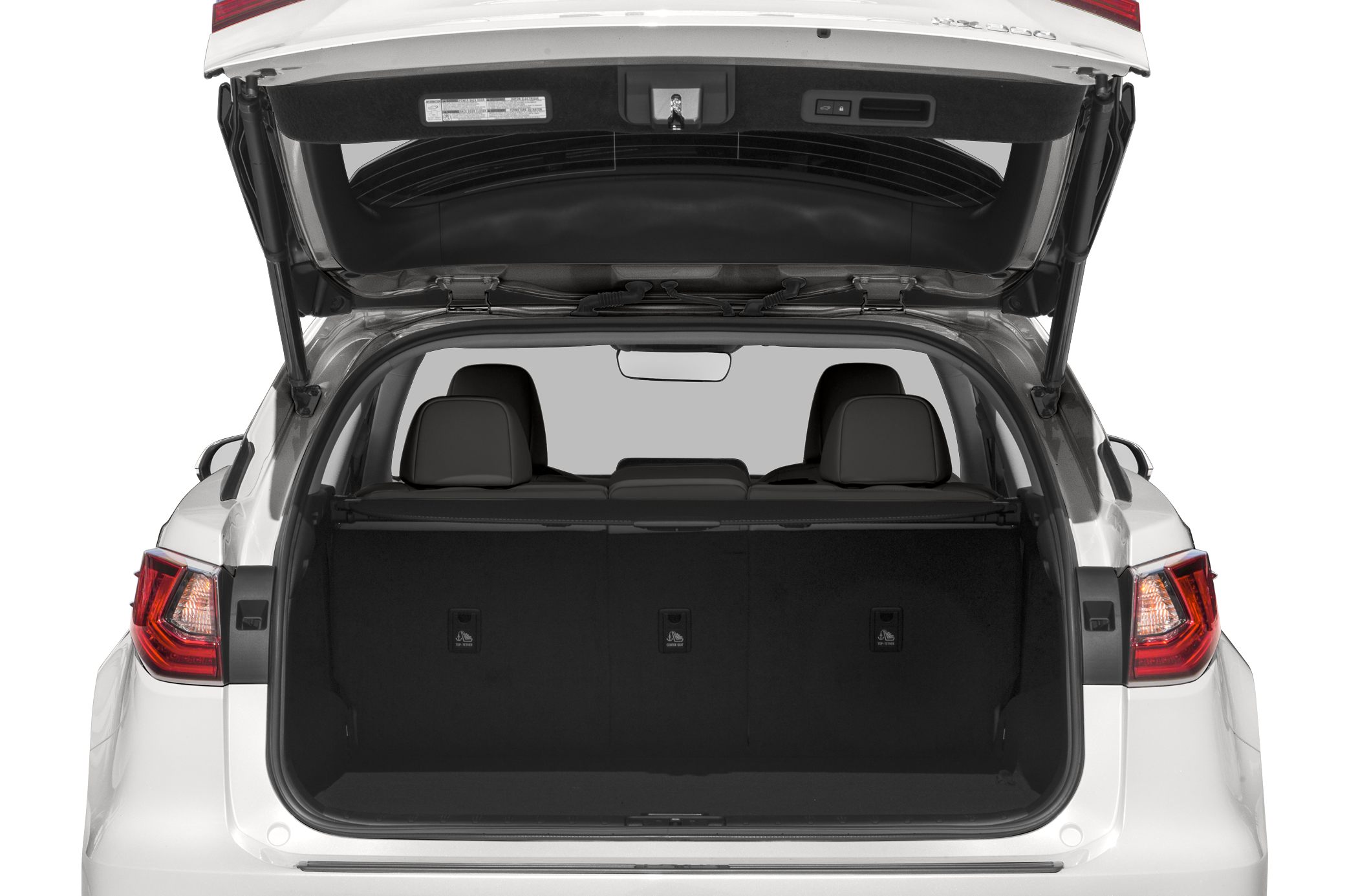 Open rear cargo space and trunk of an SUV with rear seats visible