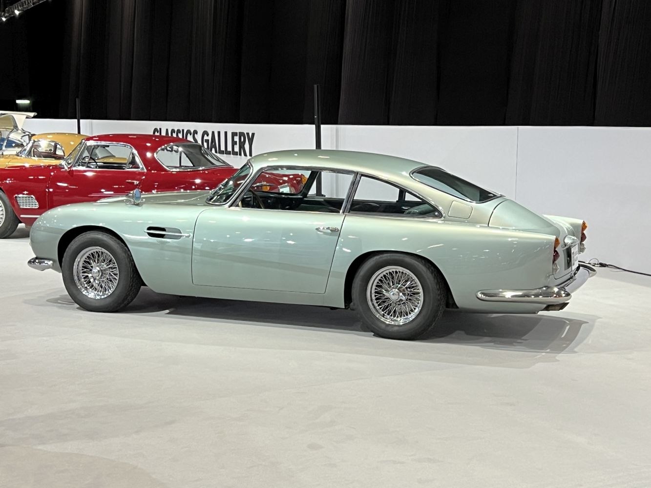 Vintage sports coupé with wire-spoke wheels and smooth side profile