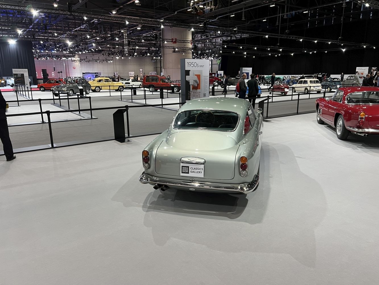 Rear view of a classic vintage coupe with chrome bumper and distinct tail lights.