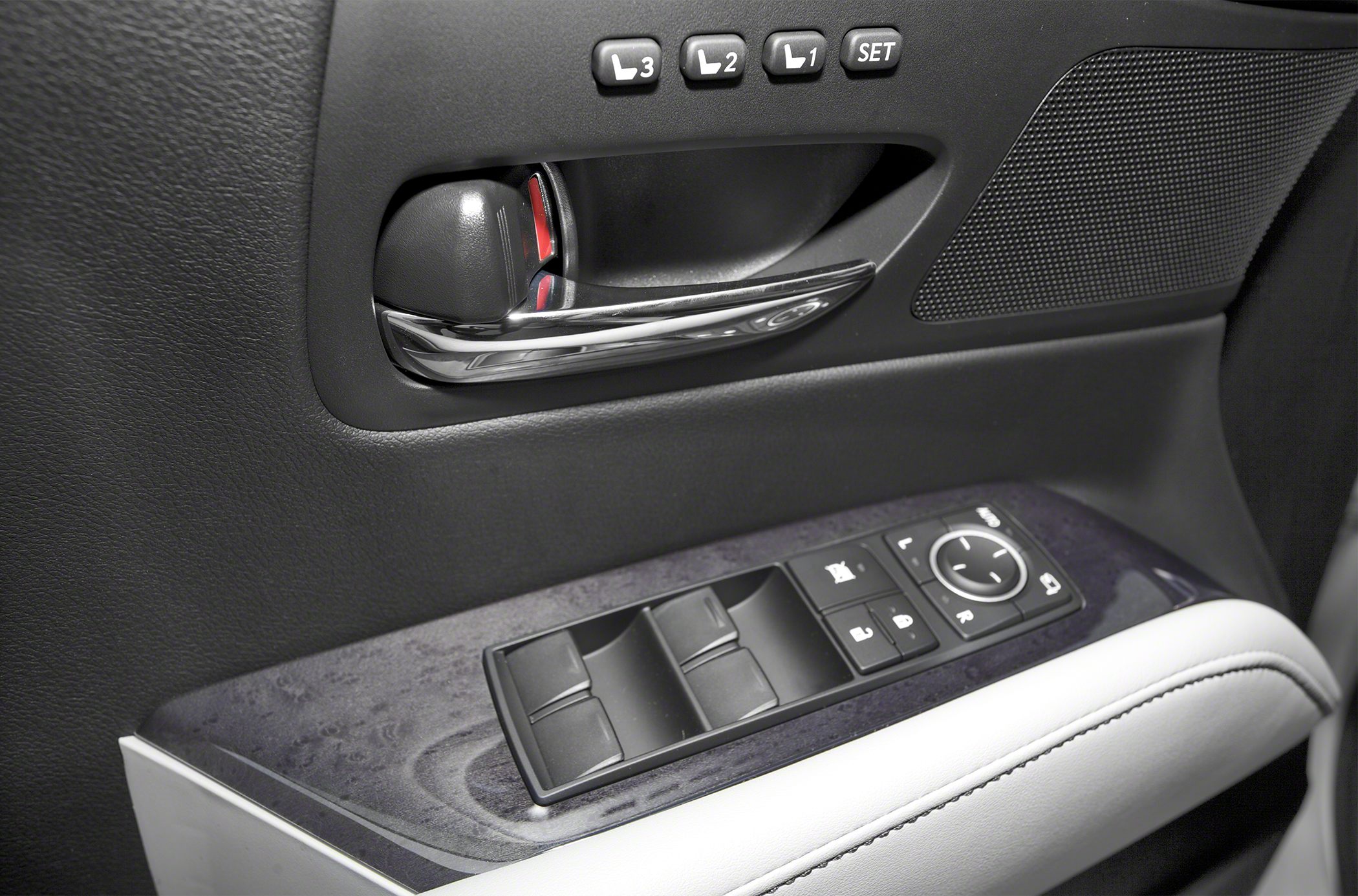 Interior door panel with memory seat and window controls