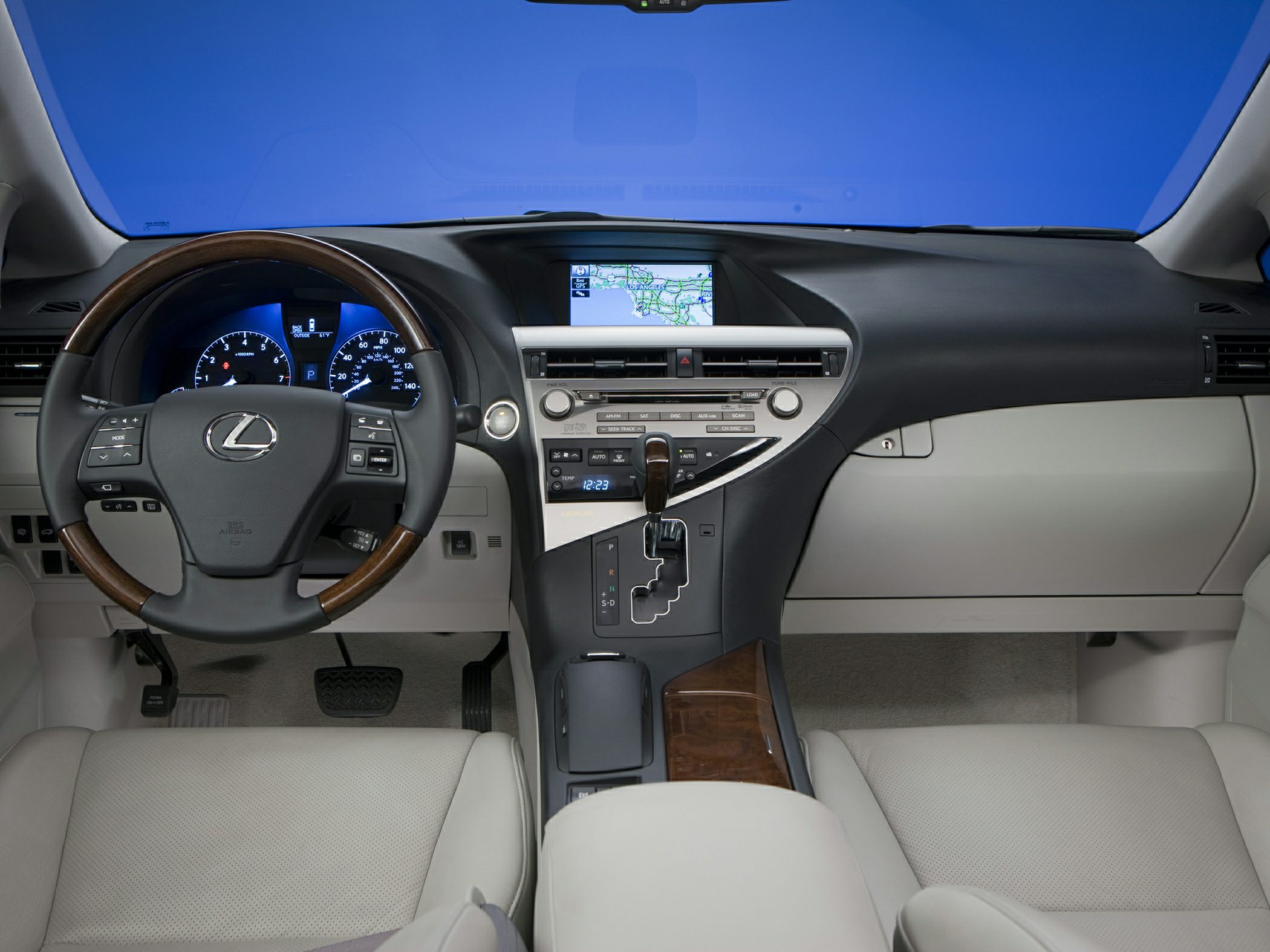 Leather-wrapped steering wheel, central touchscreen navigation, modern dashboard design