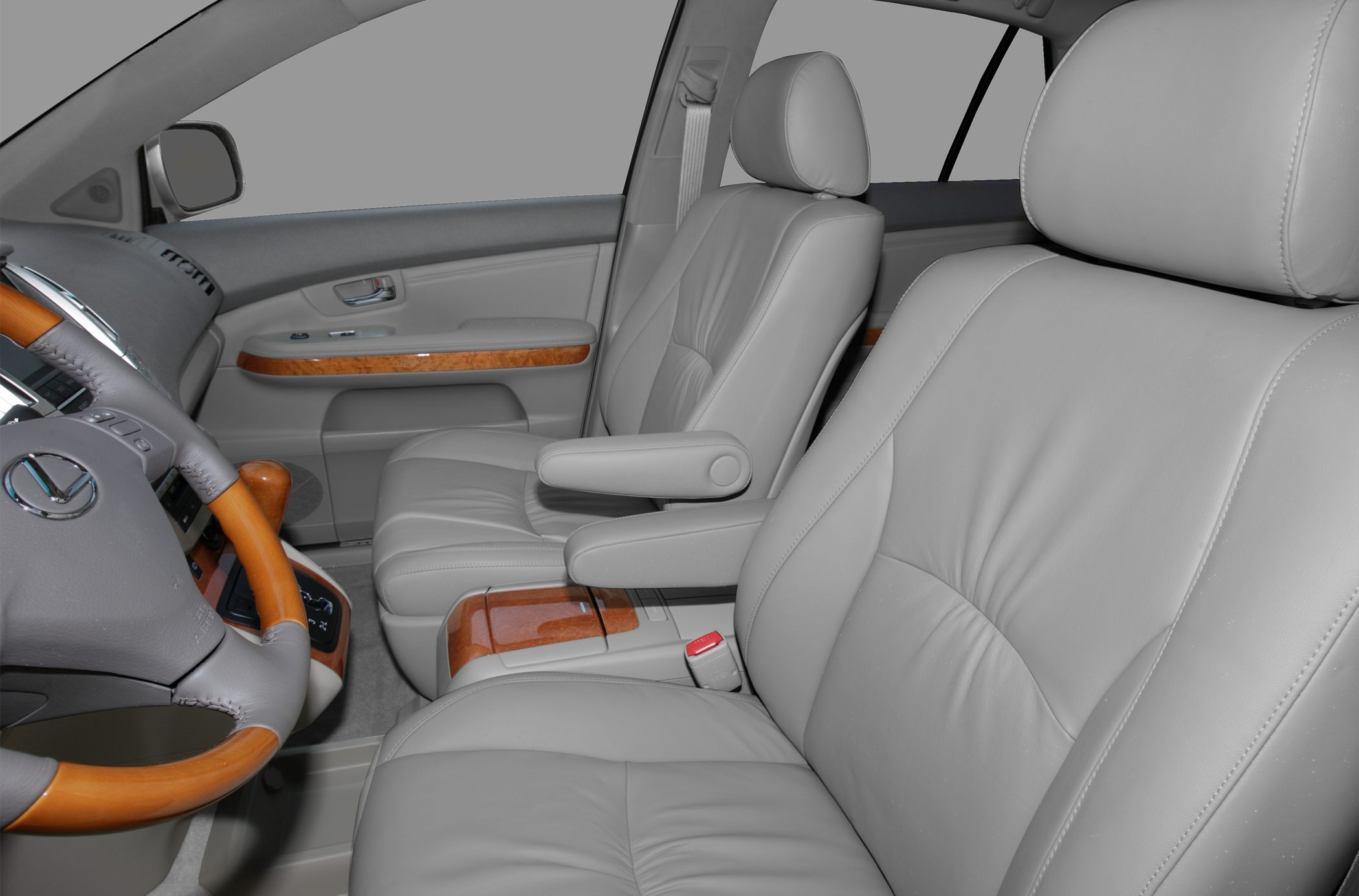 Leather seats and wood trim within a car interior