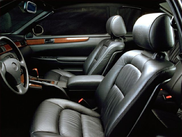 Luxurious leather seats and wood trim in a classic car interior