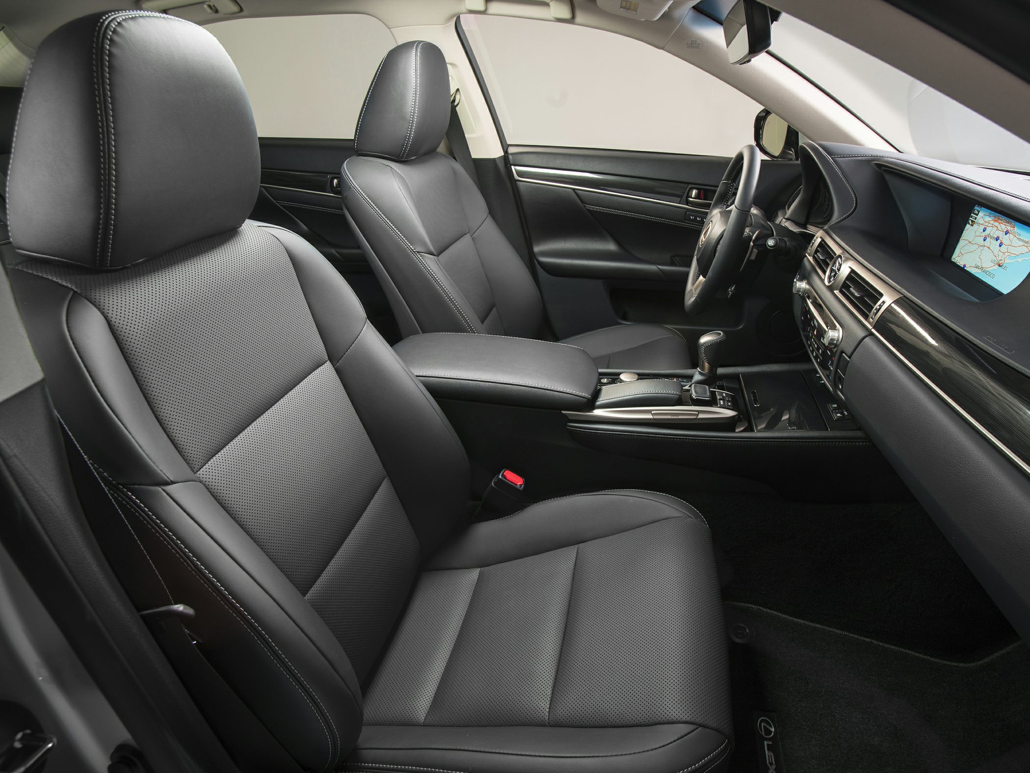 Black leather seats and central console with navigation display