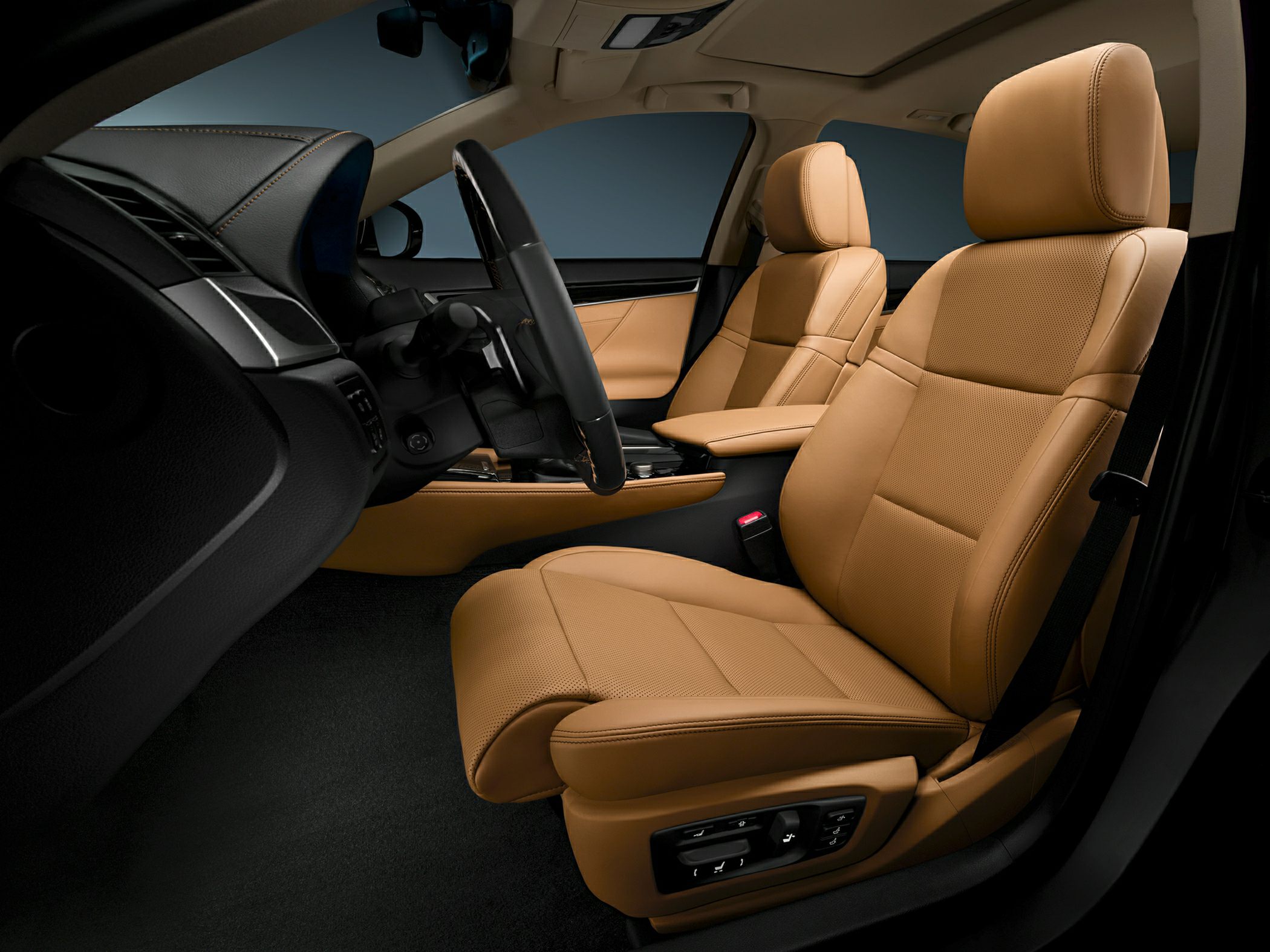 Premium tan leather front seats with ergonomic design and seat adjustment controls