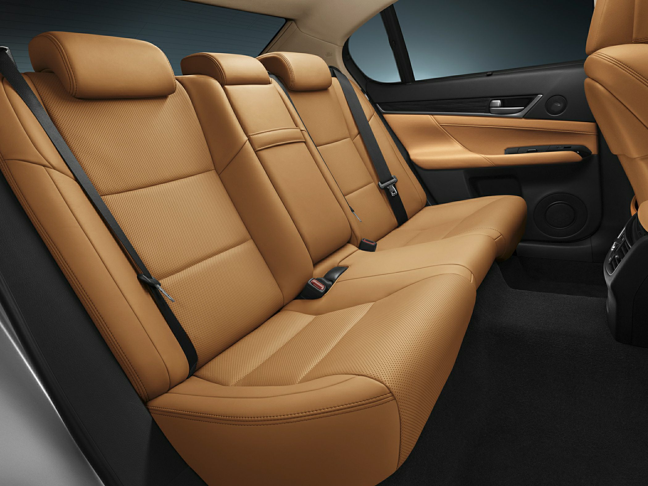 Tan perforated leather rear seats with seat belts and armrest