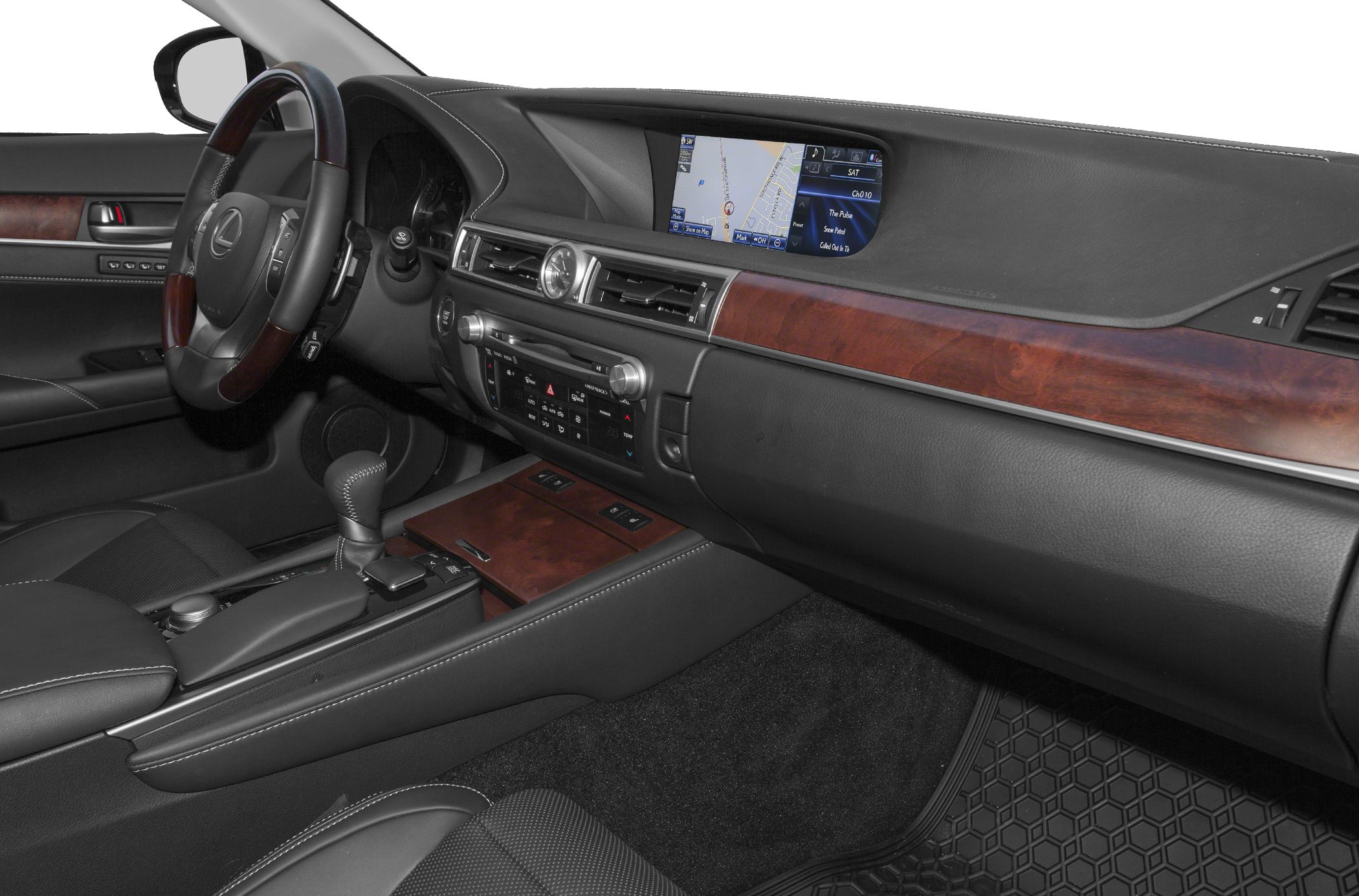 Wood-trimmed dashboard and navigation display with leather interior.