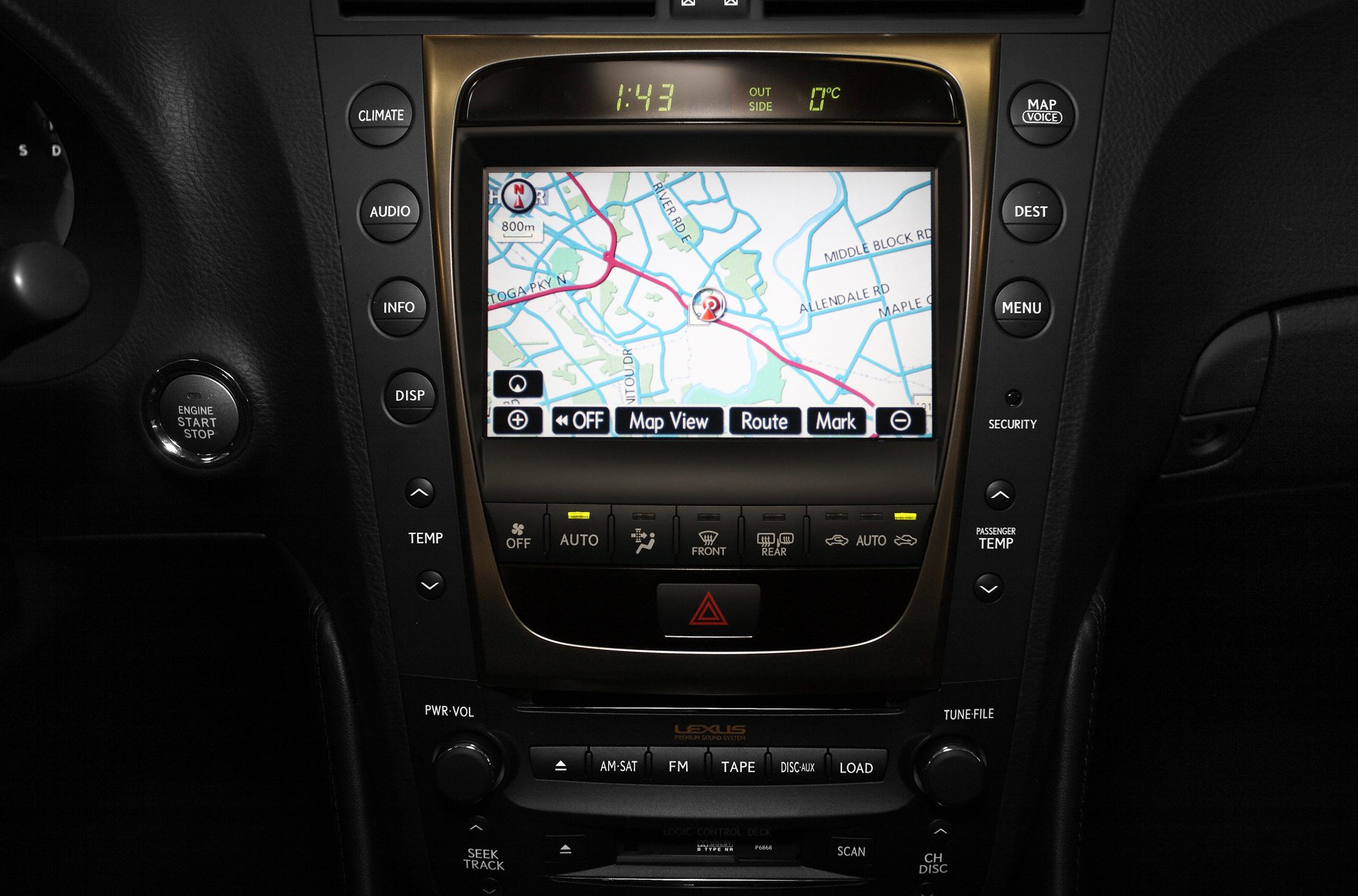 Navigation screen with climate and audio controls in center console
