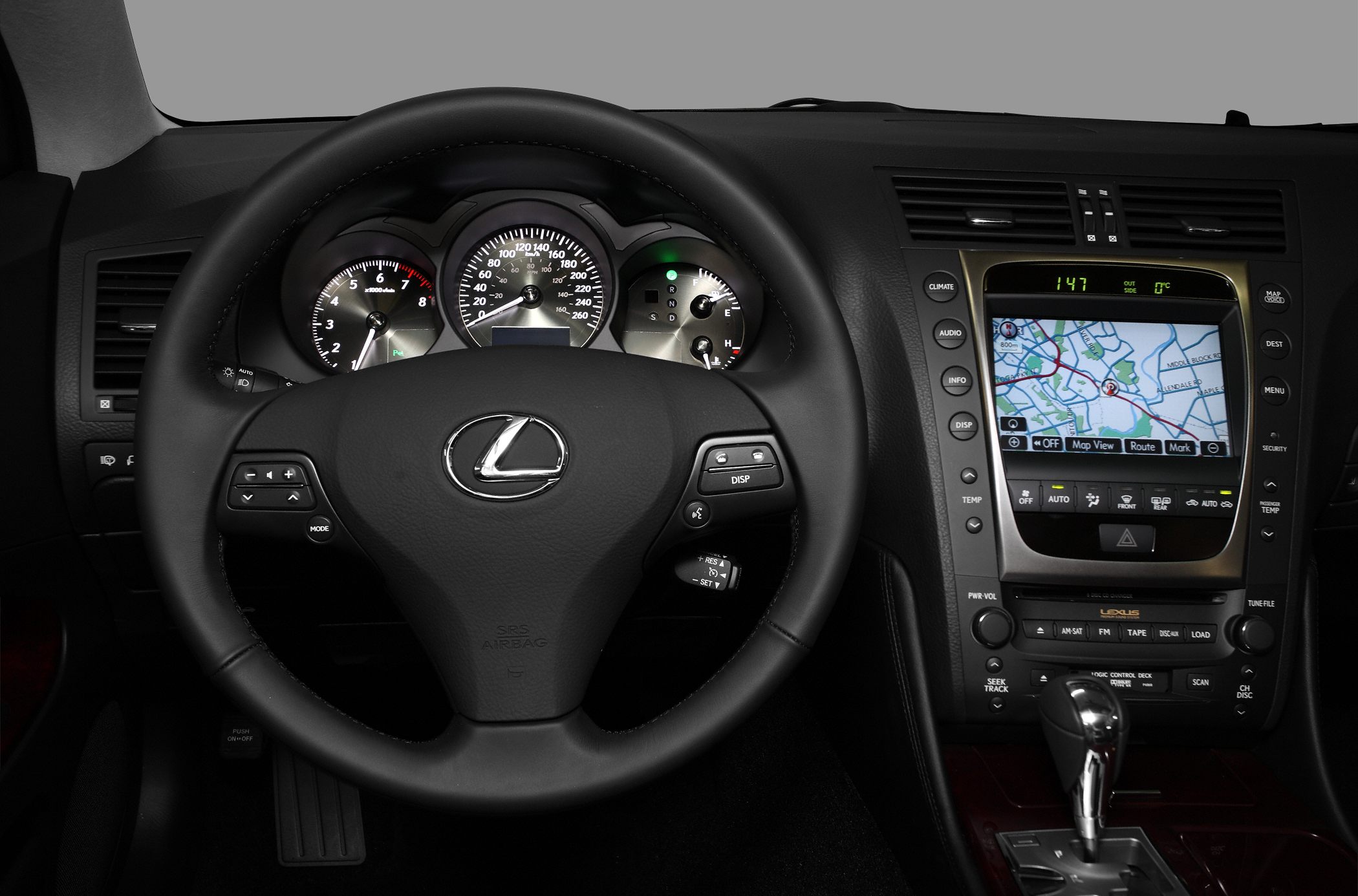 Multifunction steering wheel with gauges and center console navigation system