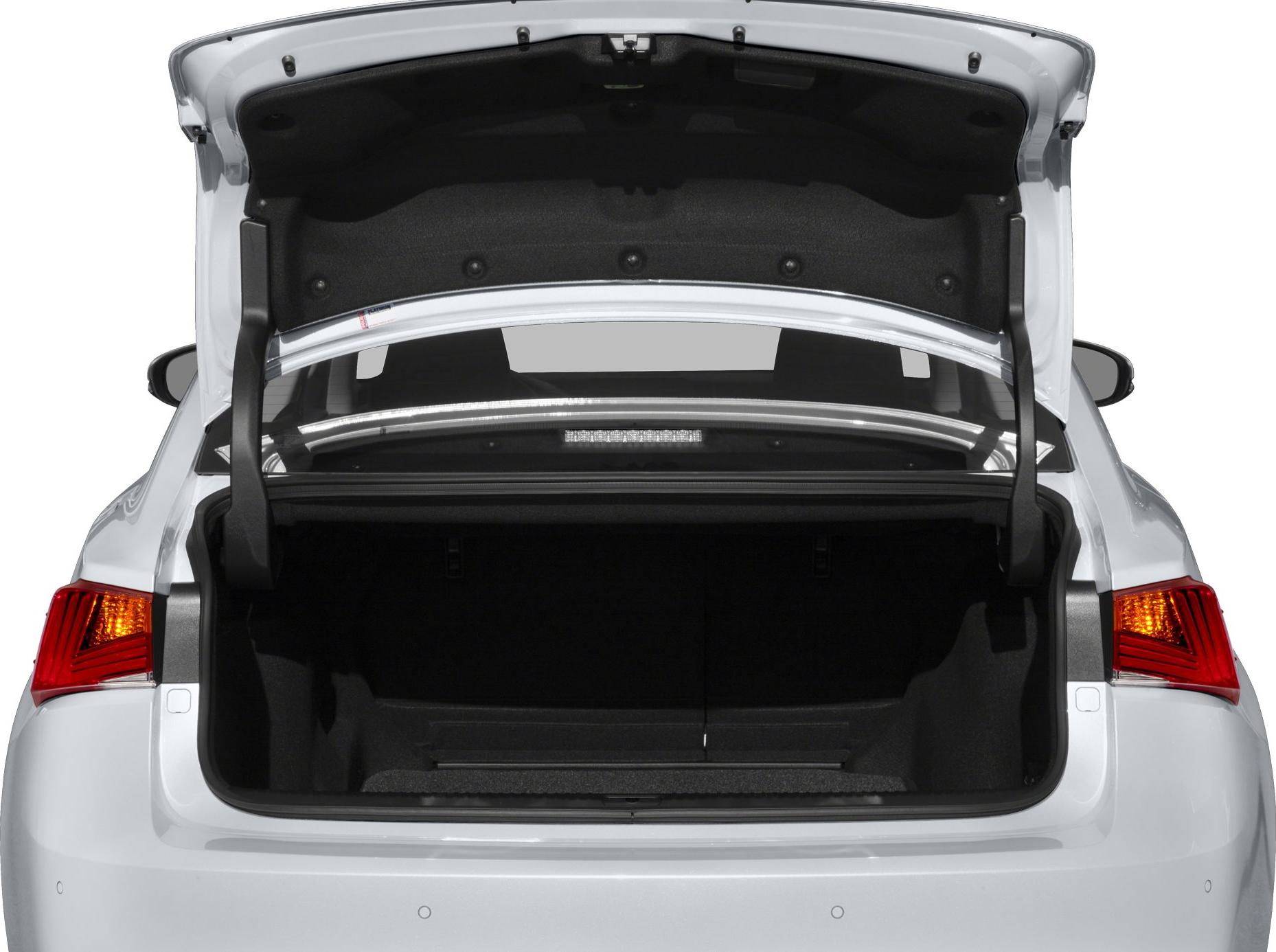 Open trunk and illuminated rear lights of a sedan.
