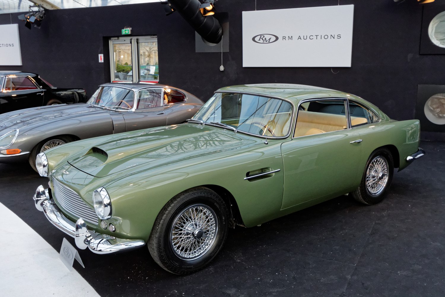 Vintage coupe with wire spoke wheels and distinctive front grille