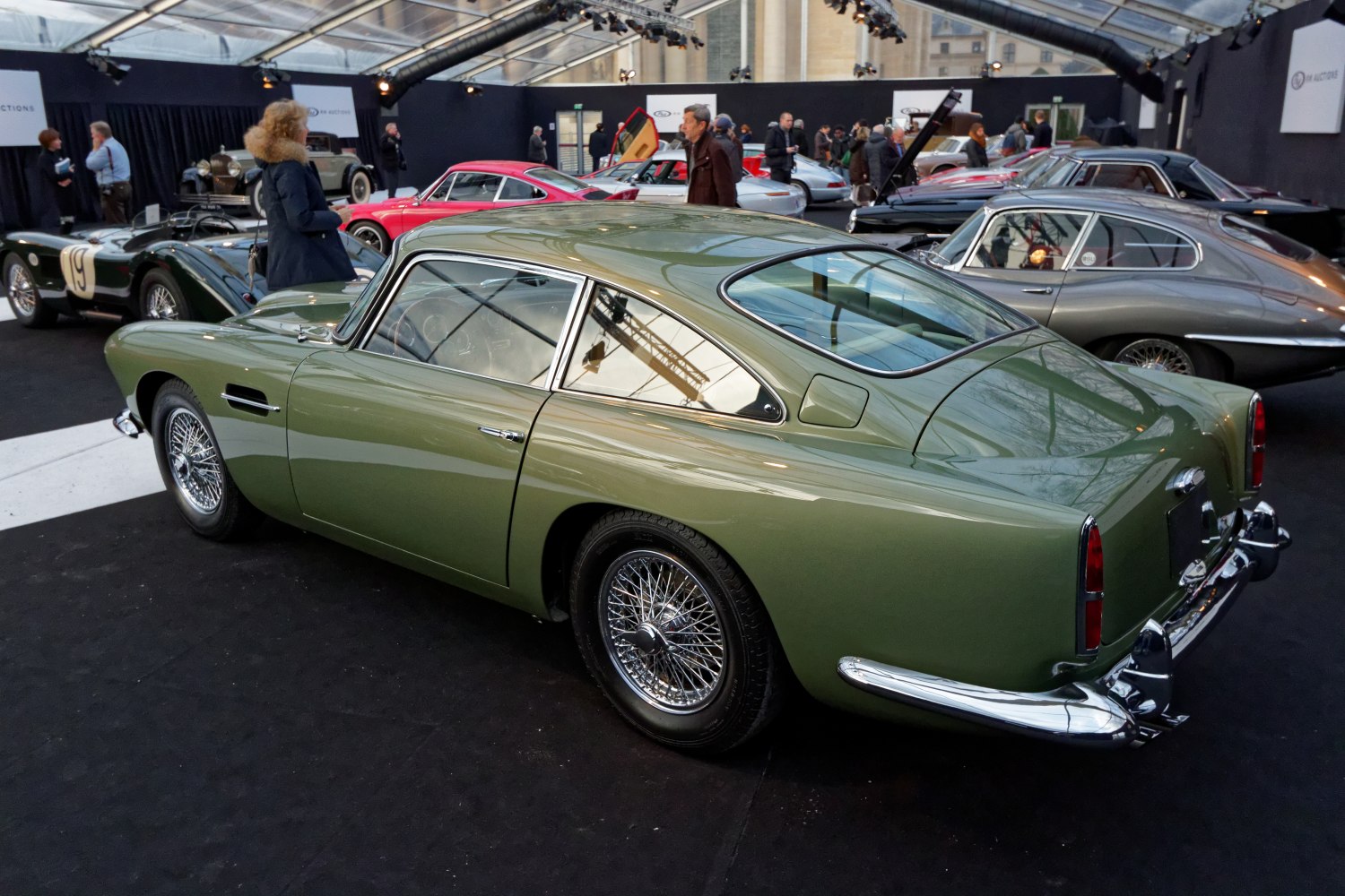 Vintage sports coupe with wire spoke wheels and sleek rear design