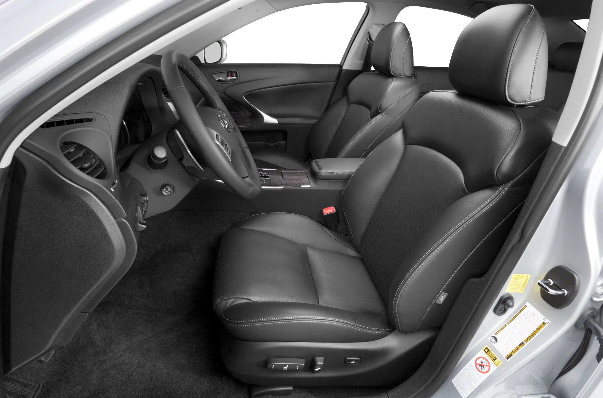 Black leather ergonomic front seats with detailed stitching and adjustable controls