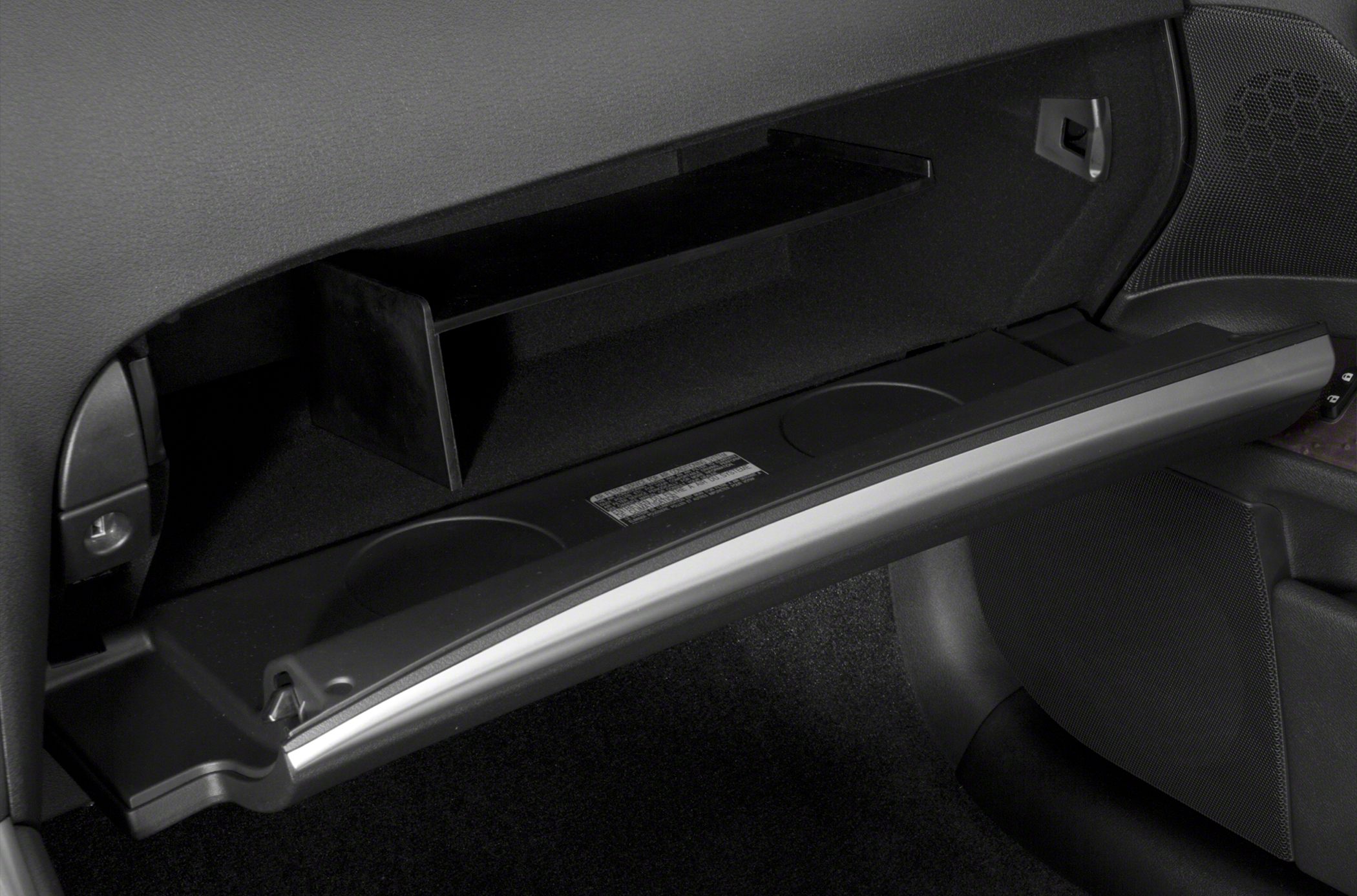 Open glove compartment with dual cup holders and storage divider