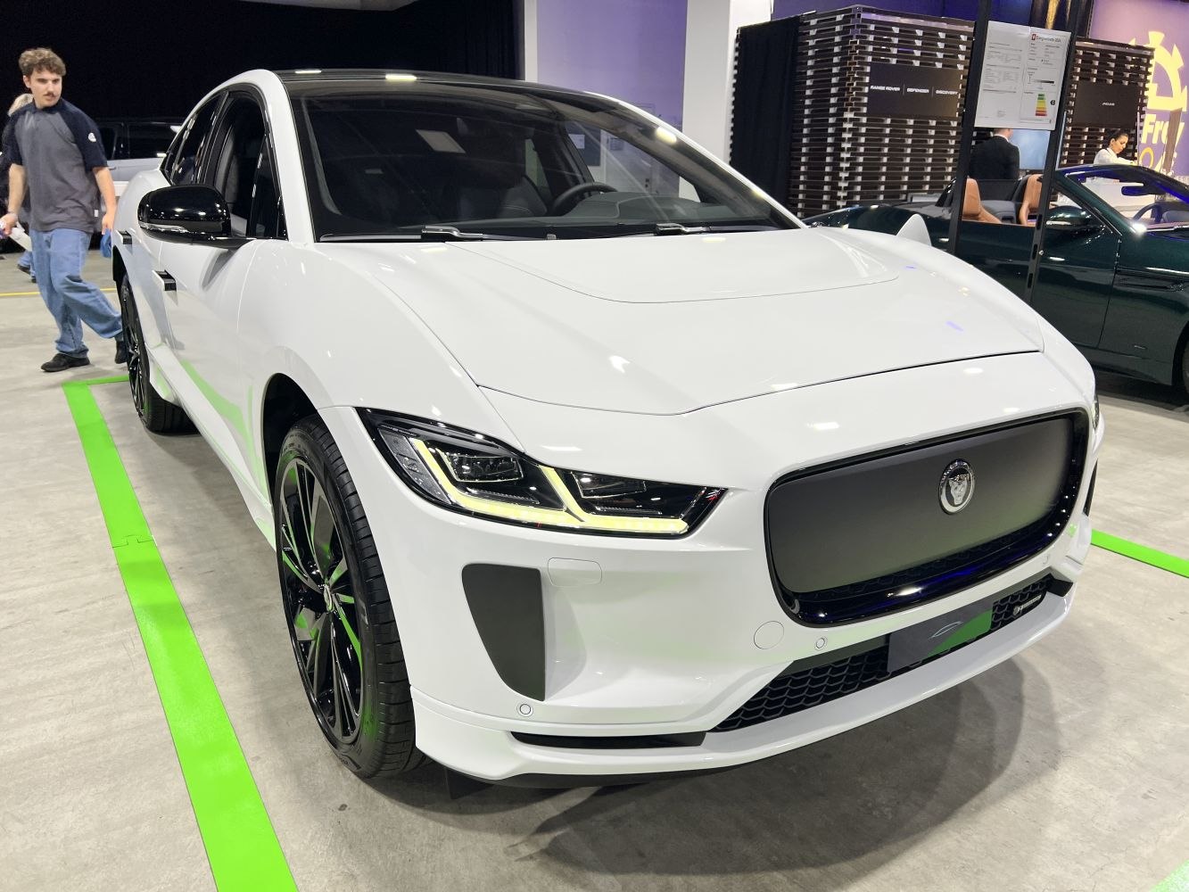 Front view LED headlights closed grille modern electric SUV