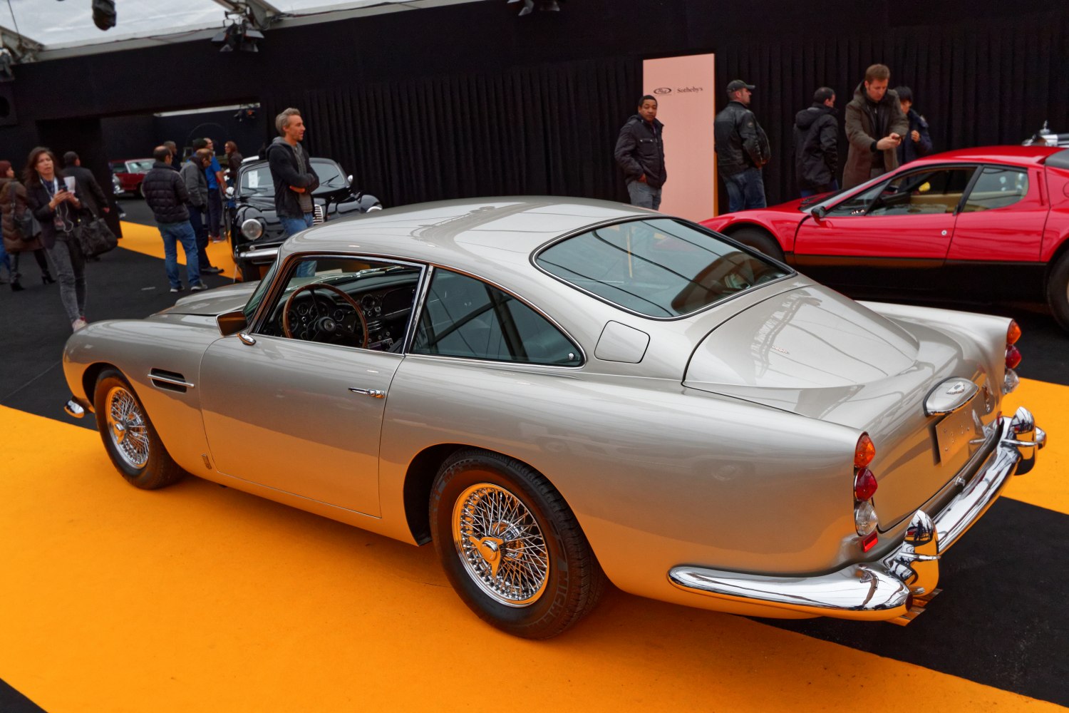 Vintage luxury sports coupe with wire wheels and chrome bumpers