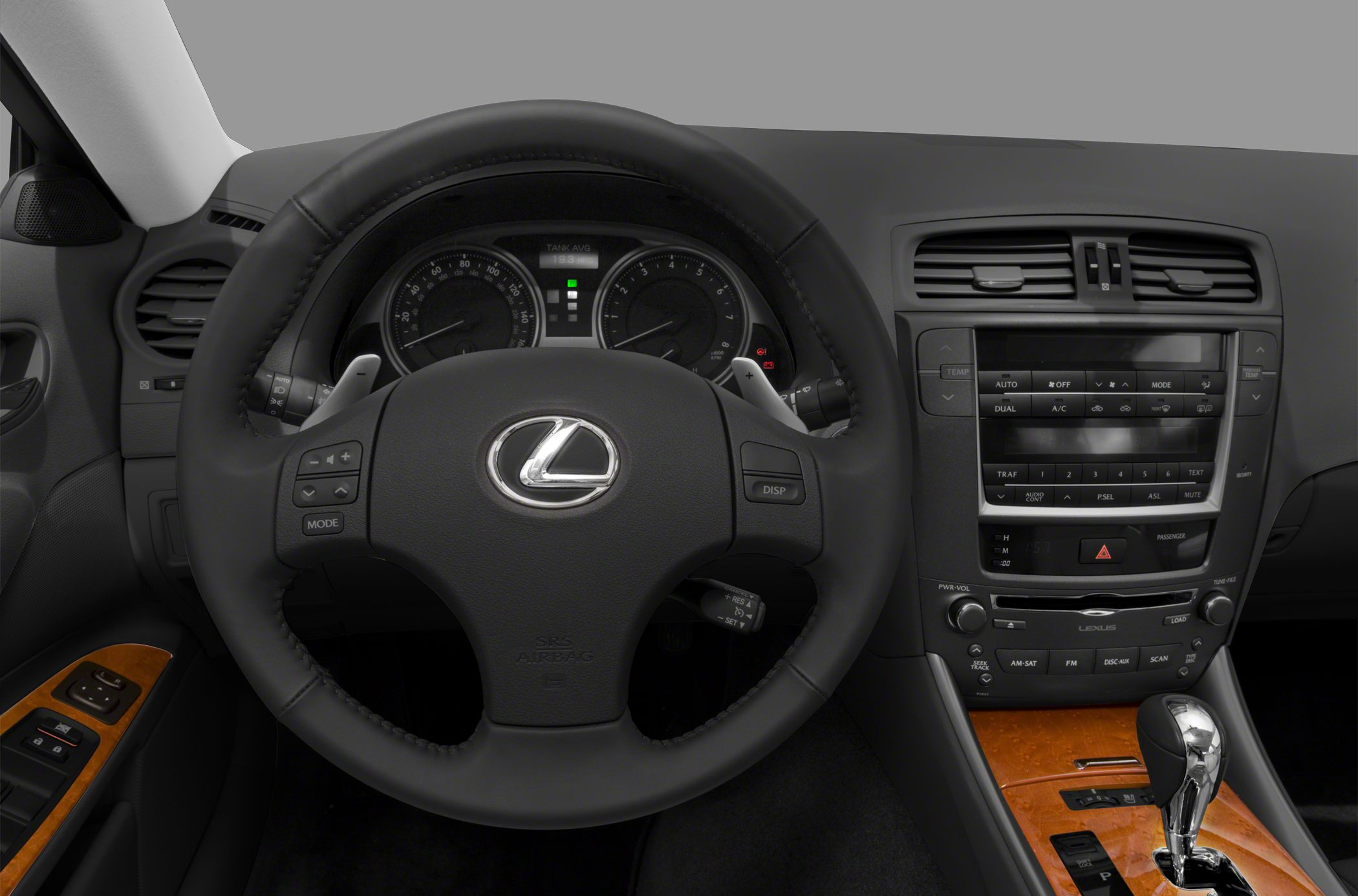 Dashboard, steering wheel, gear shifter, and center console interior elements