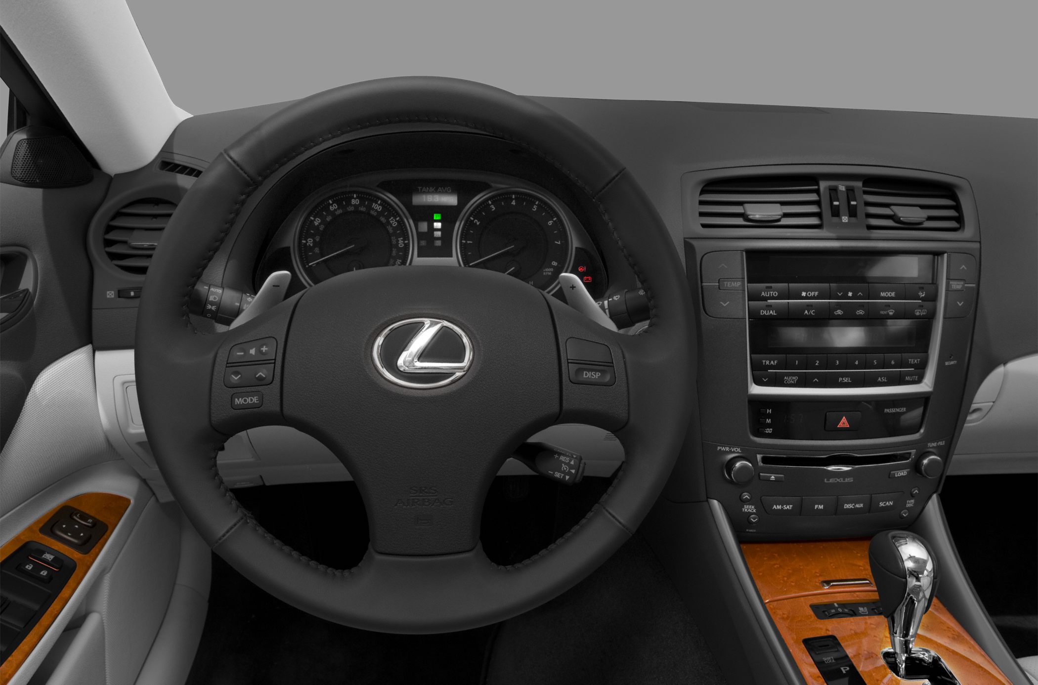 Dashboard, steering wheel, and gear shift console with wood trim