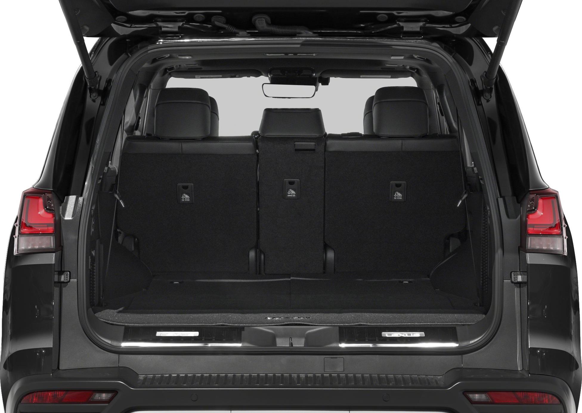 Open rear cargo area with three rear seats and spacious trunk.
