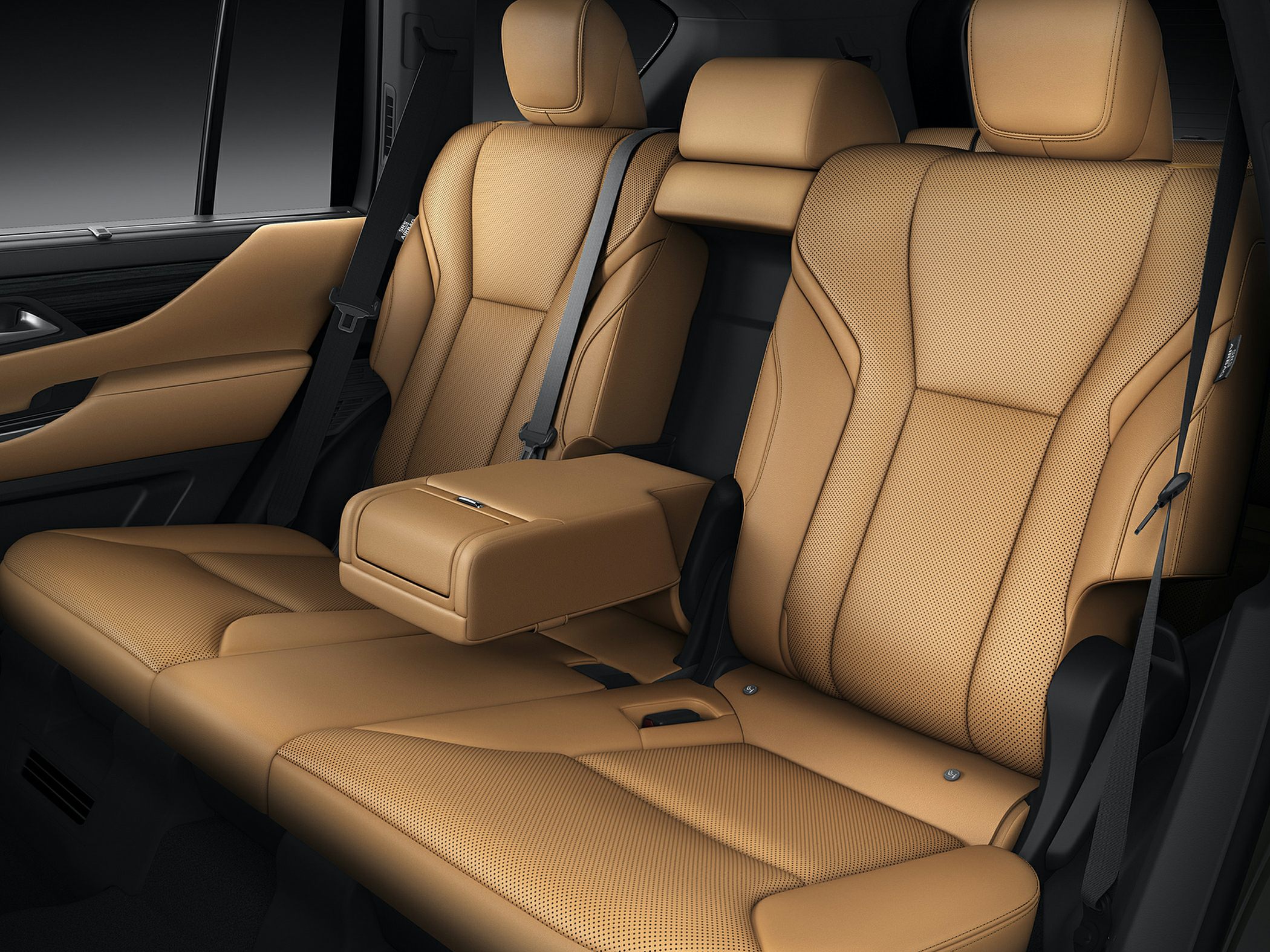 Premium perforated brown leather rear seats with center armrest
