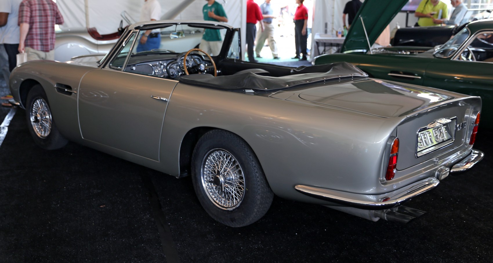 Convertible classic car with wire-spoke wheels and sleek body lines