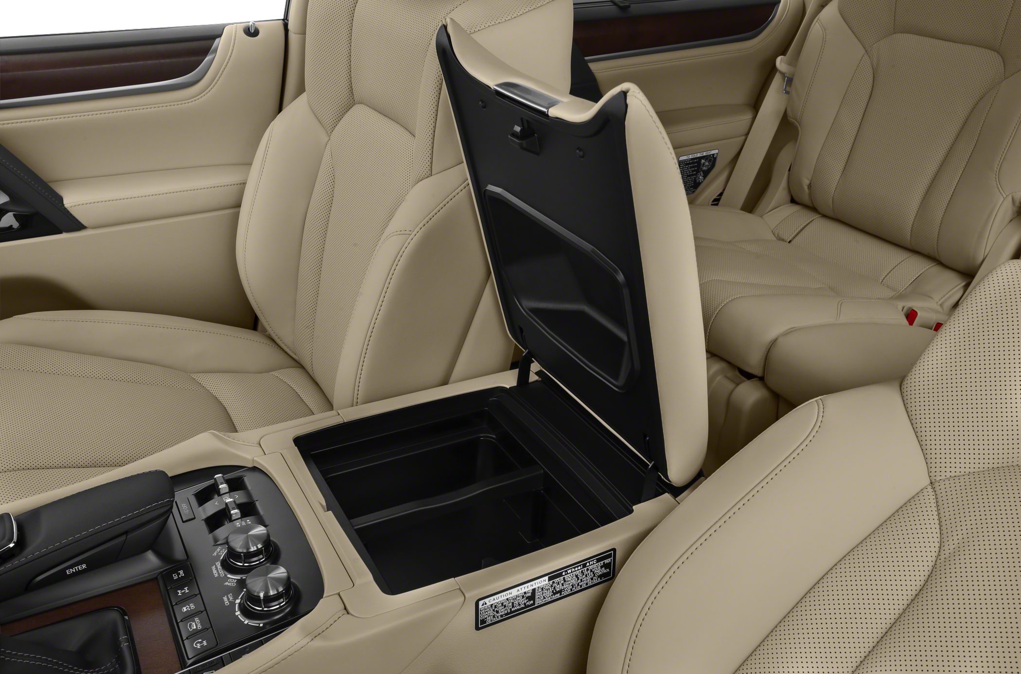 Beige leather seats with open center console storage and control knobs