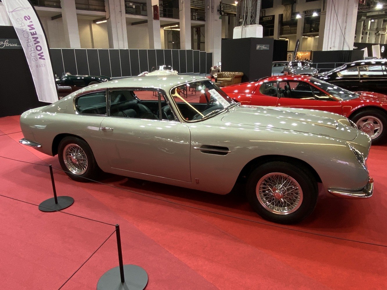 Vintage sports coupe with wire wheels and sleek fastback design
