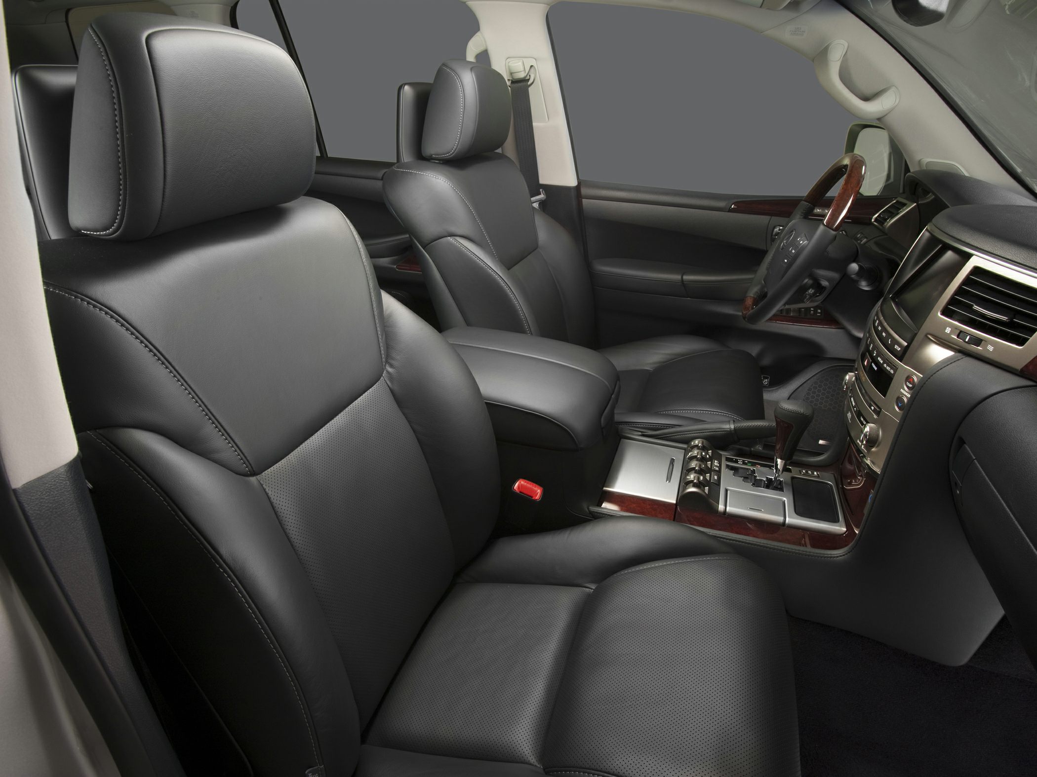 Black leather seats and advanced dashboard with wood trim