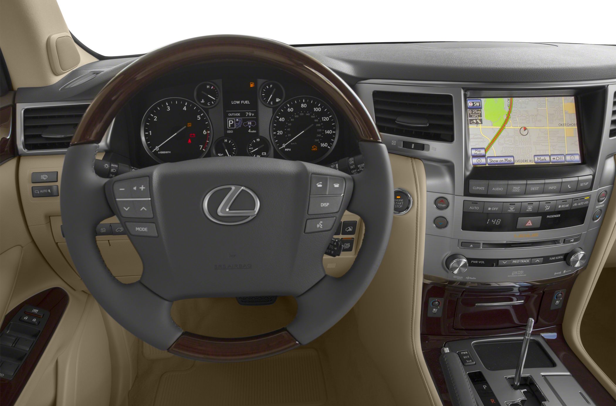Luxury SUV interior with steering wheel, dashboard instruments, and infotainment screen