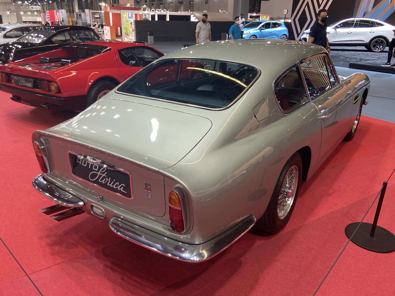 Classic rear design with chrome bumpers and elegant curved roofline.