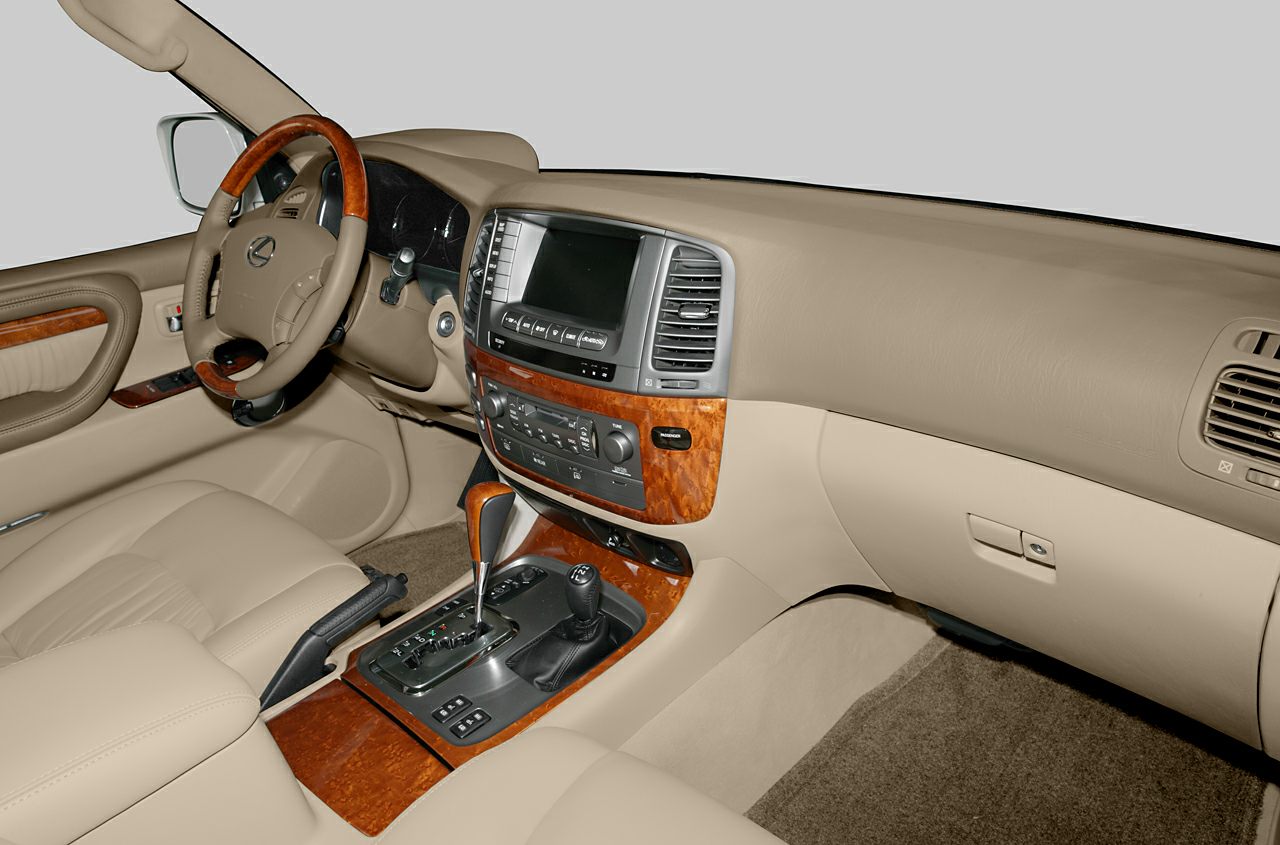 Beige leather interior with wood trim dashboard and center console