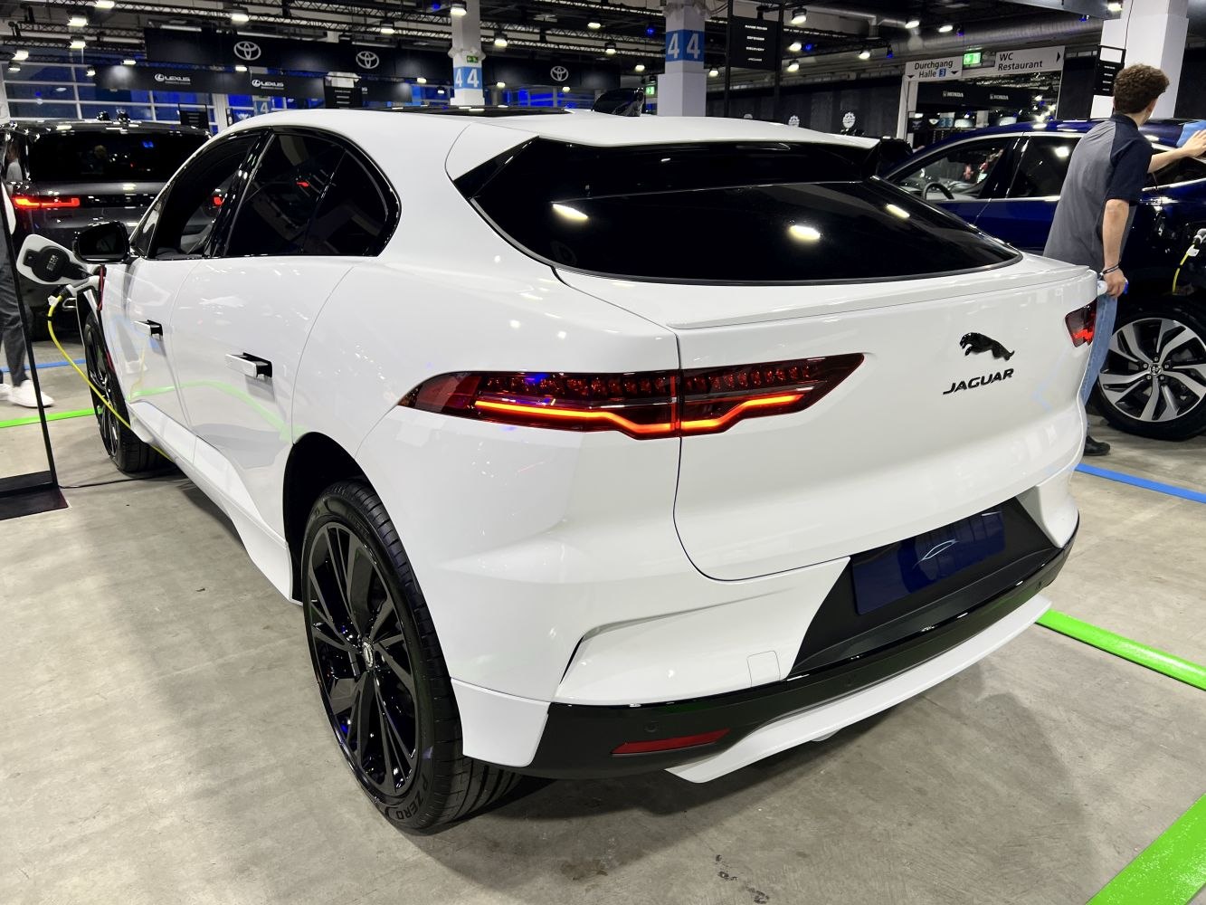 Rear view of electric SUV with LED taillights and charging port