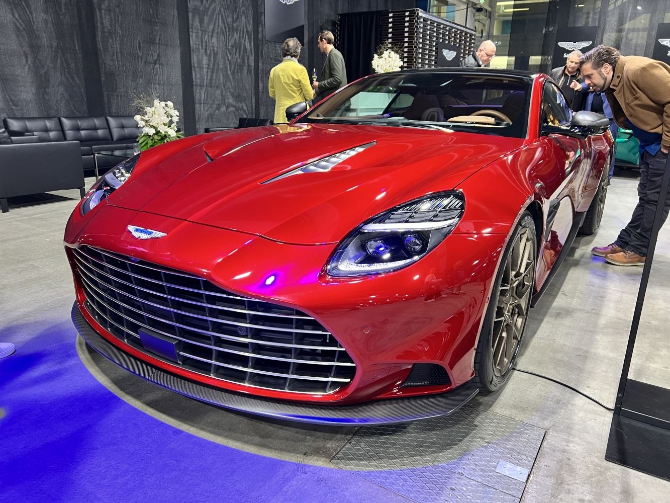 Sleek front grille with LED headlights and carbon fiber lip