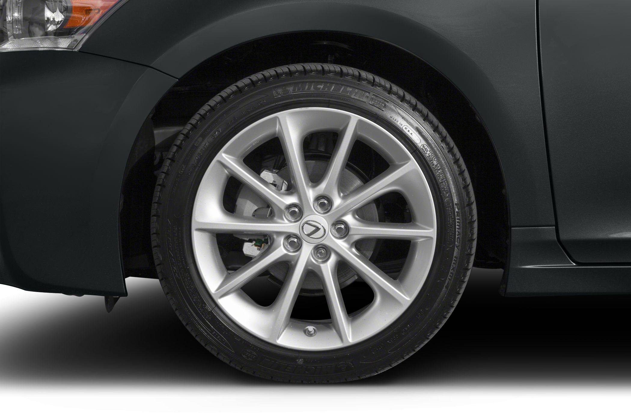 Close-up of Lexus alloy wheel and tire with visible brake disc