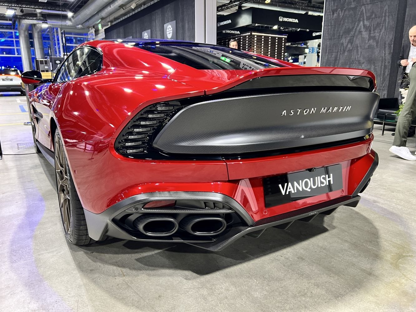 Rear view with quad exhausts and carbon fiber trim