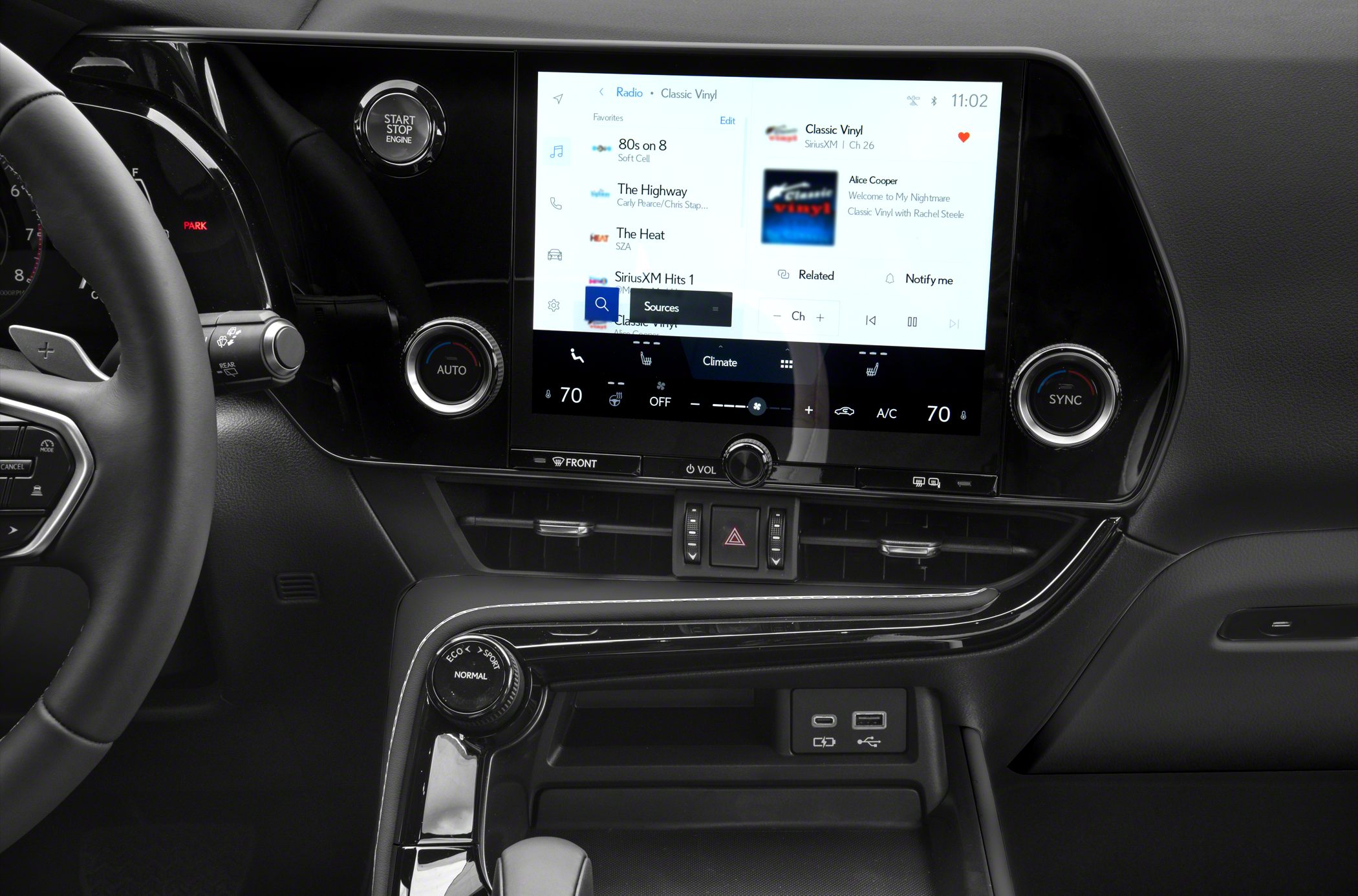 Large multimedia touchscreen and modern climate controls with drive mode selector