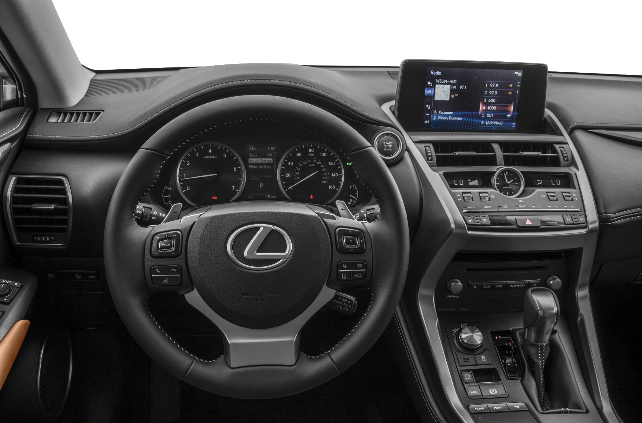 Dashboard with digital display, analog clock, and multifunction steering wheel