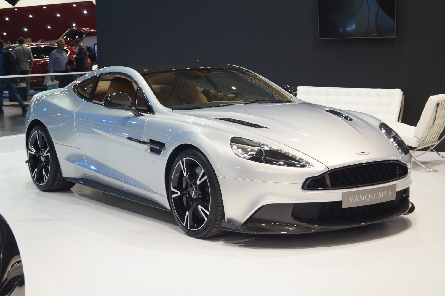 Silver luxury coupe with aerodynamic vents and black wheels