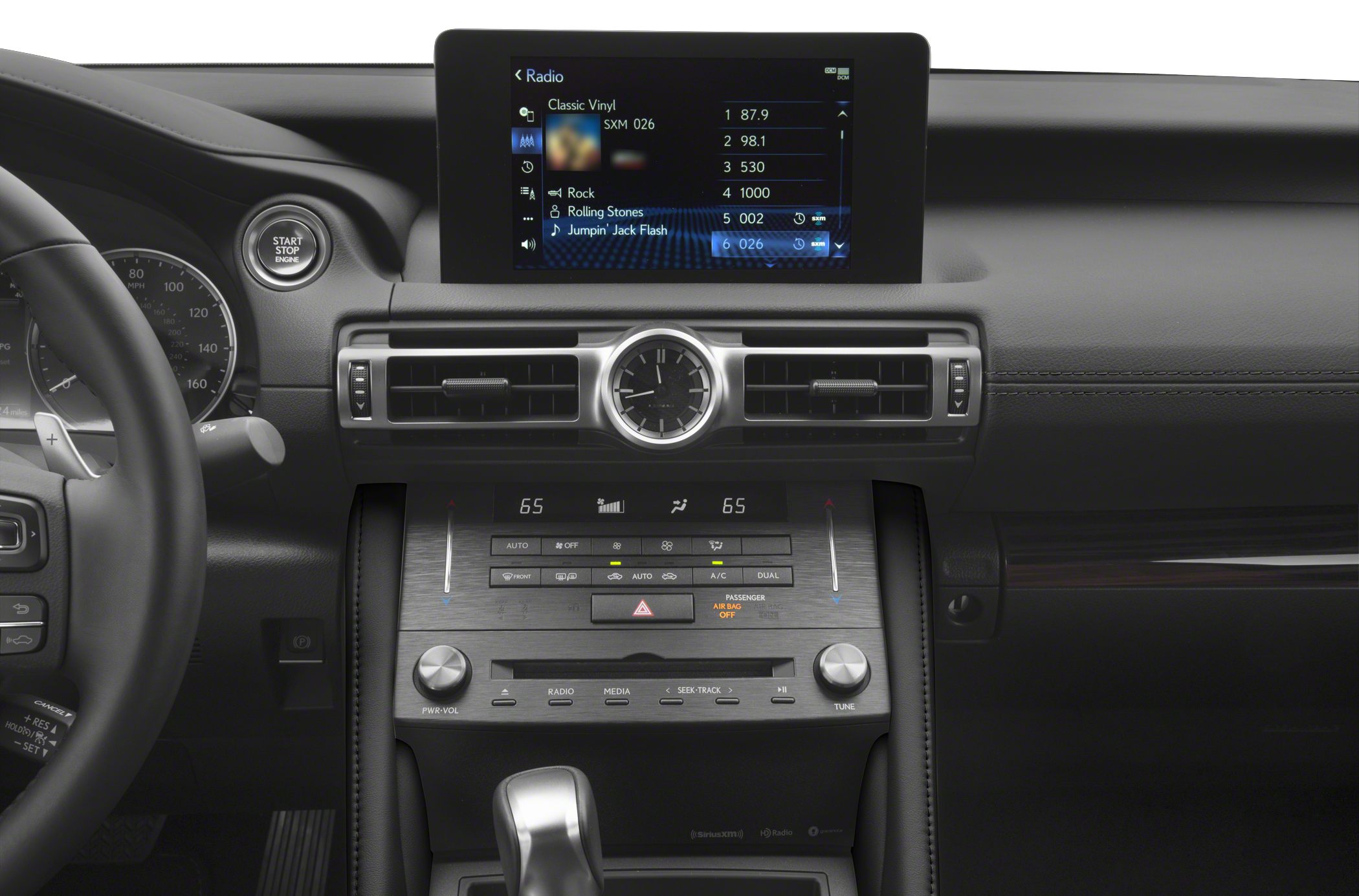 Interior dashboard with infotainment screen and analog clock