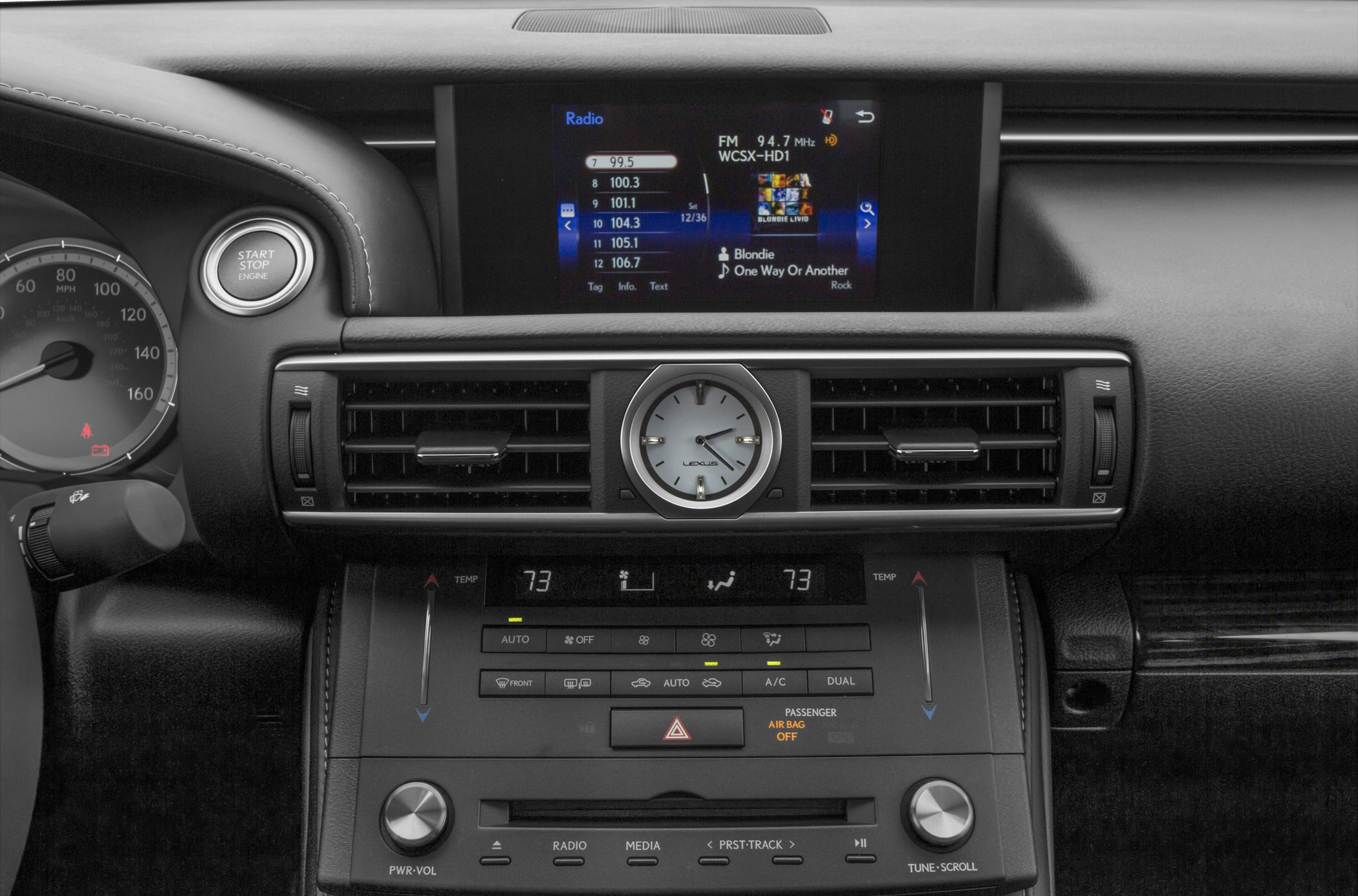 Lexus RC dashboard with analog clock and radio infotainment display