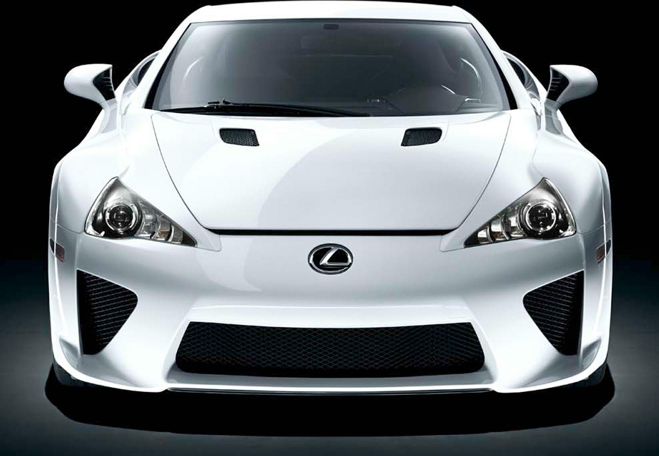 Front view with aggressive grill, aerodynamic vents, and sharp headlights.