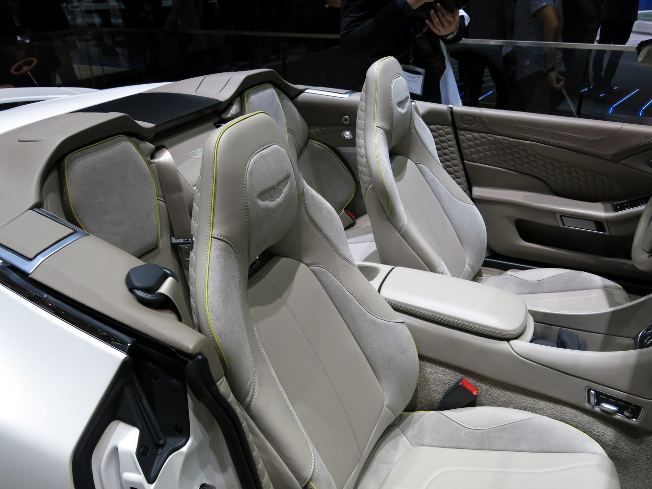 Beige leather and suede seats with detailed stitching in convertible interior