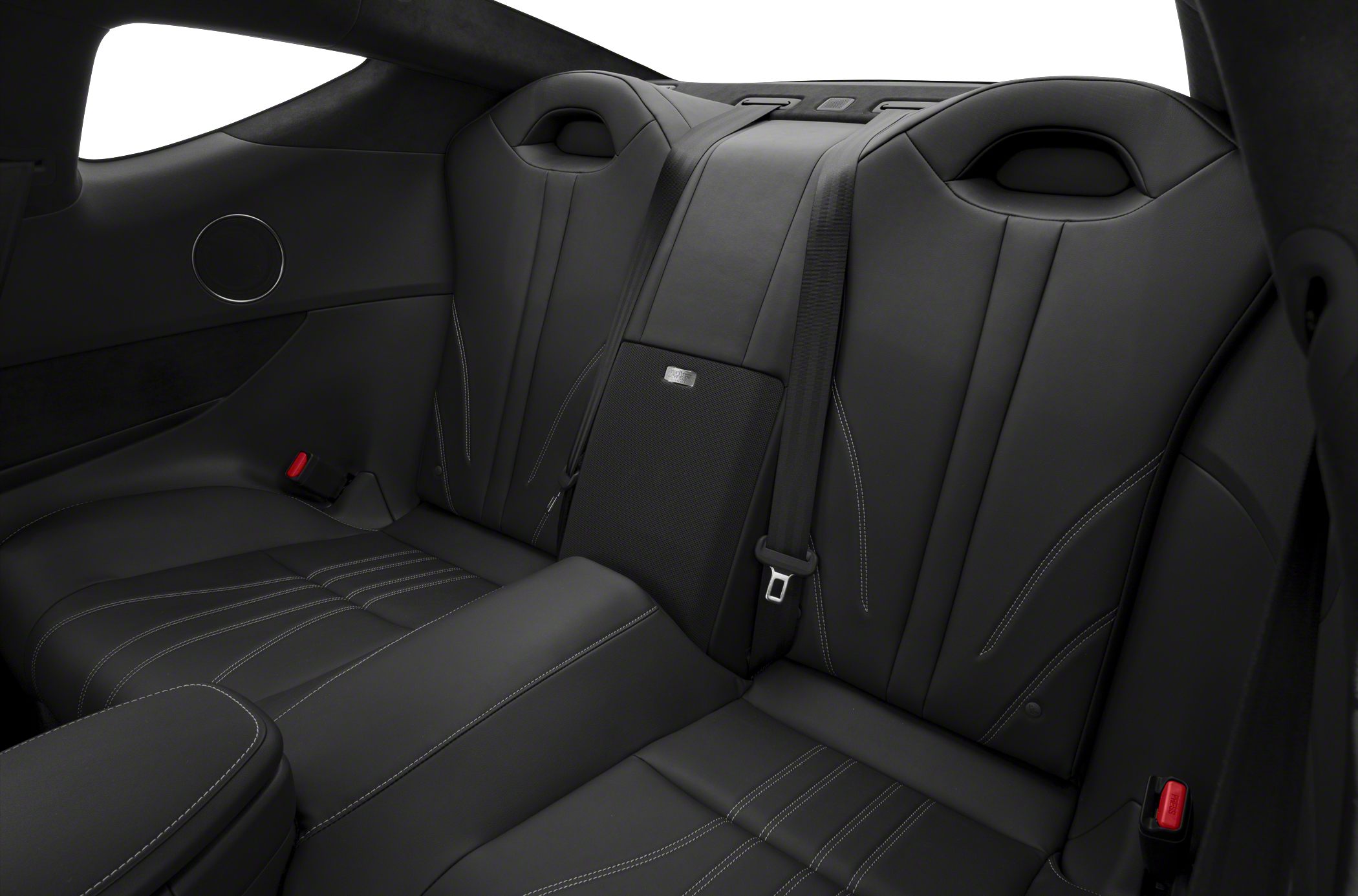 Rear leather seats with detailed stitching and seat belts