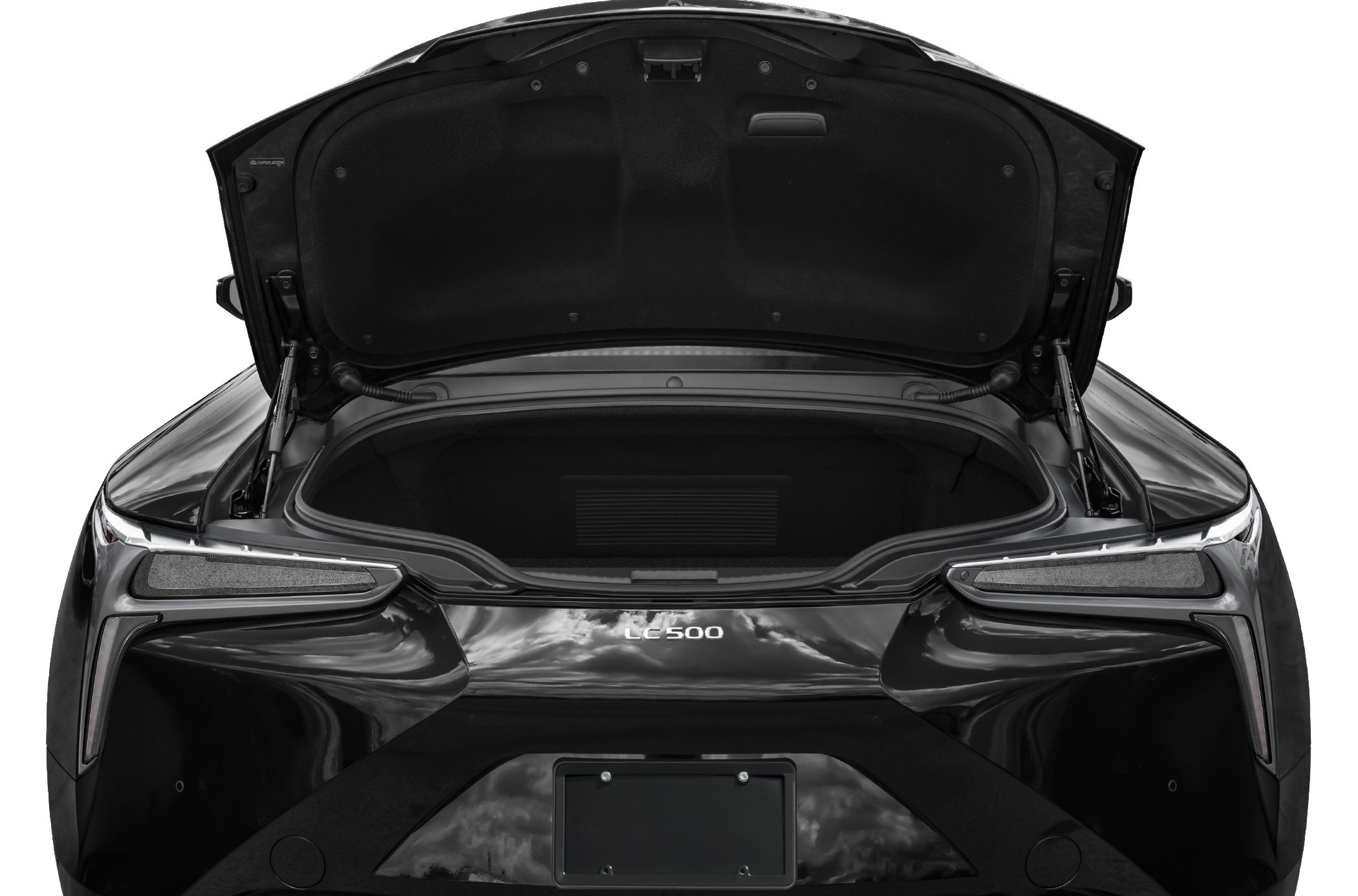 Rear trunk open with spacious cargo area of a 2018 coupe